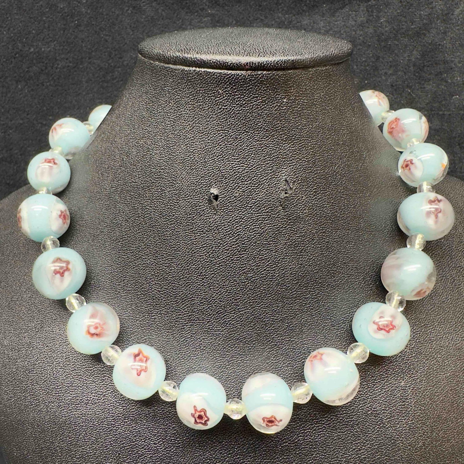 Venetian Murano Lamp Work Art Glass Sky Blue Bead Black and White Beaded Accents Necklace D28: Venetian Murano Lamp Work Art Glass Sky Blue Bead Black and White Beaded Accents Necklace D28. Necklace with light sky blue colored glass beads with beautiful designs on each. The necklace features bl
