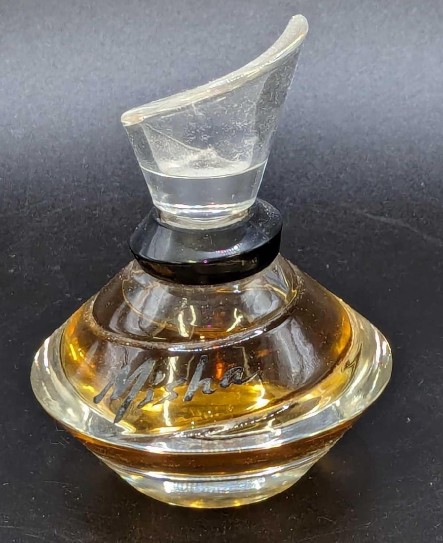 Misha Richard Berre Perfume 1 fl oz: Misha Richard Berre Perfume 1 fl oz. This is approx 2 3/4" x 2 3/4" x 3 1/2" and it weighs 0.39lb. The bottle has some signs of wear and is nearly filled to the top.
