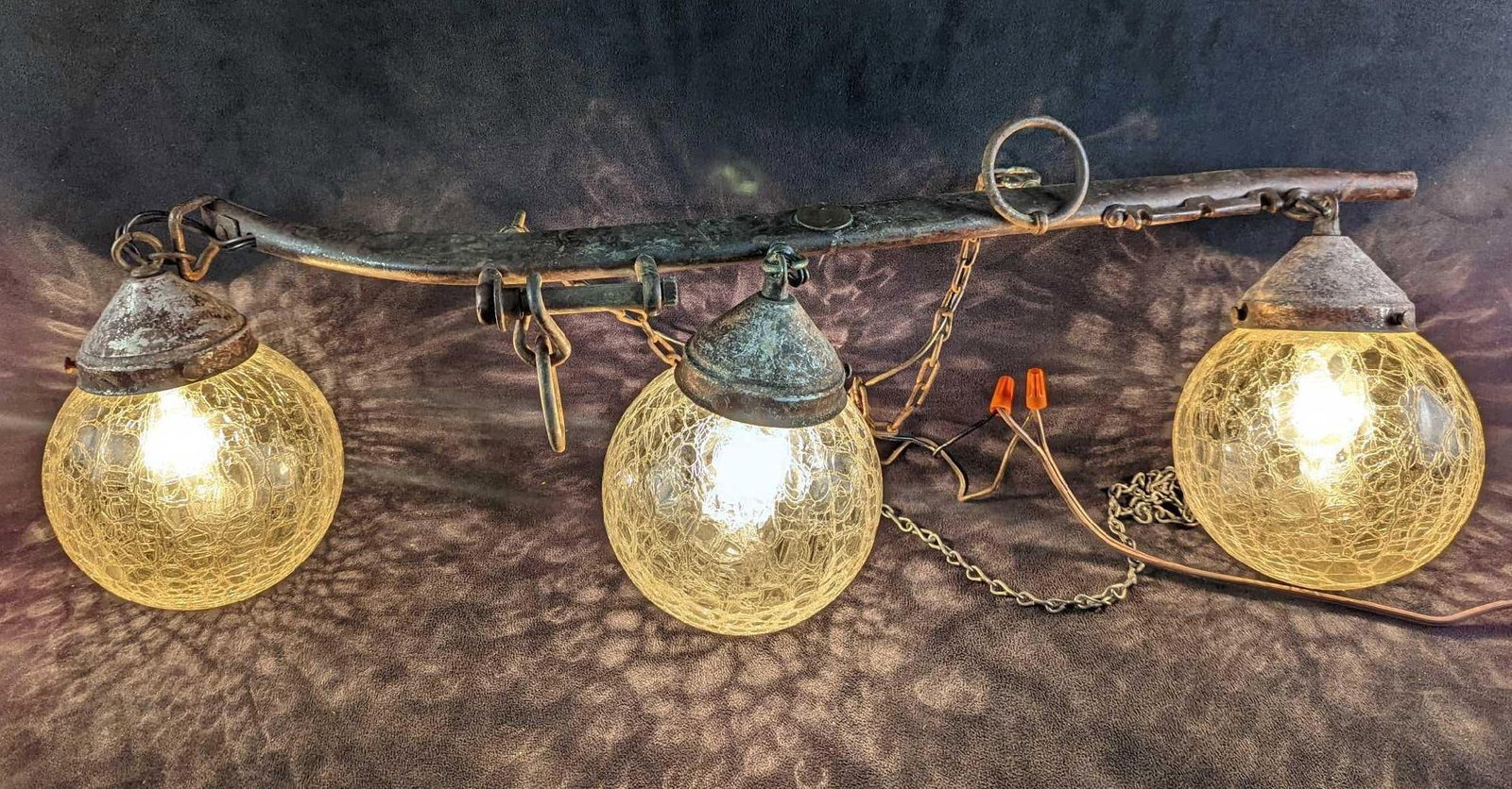 Hand Made Horse Yoke Hanging Lights: Here is a unique hanging lamp made using a vintage horse yoke. This is approx 31" x 6" x 8" and it weighs 7lbs. Was tested and it works. Is in a good, unused condition with light wear and a little rus