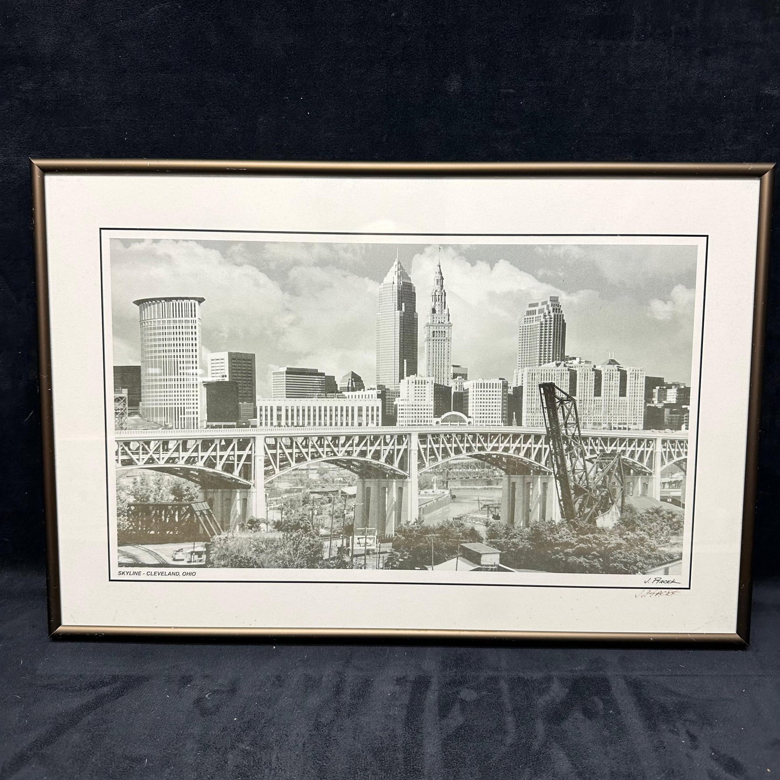 Skyline Cleveland Ohio Black and White Framed Photograph Signed Jim Ptacek: This photo image is a framed print of the Cleveland, Ohio, skyline. Signed by the artist in the bottom right corner. This item is in pre-owned, previously displayed condition with light wear and