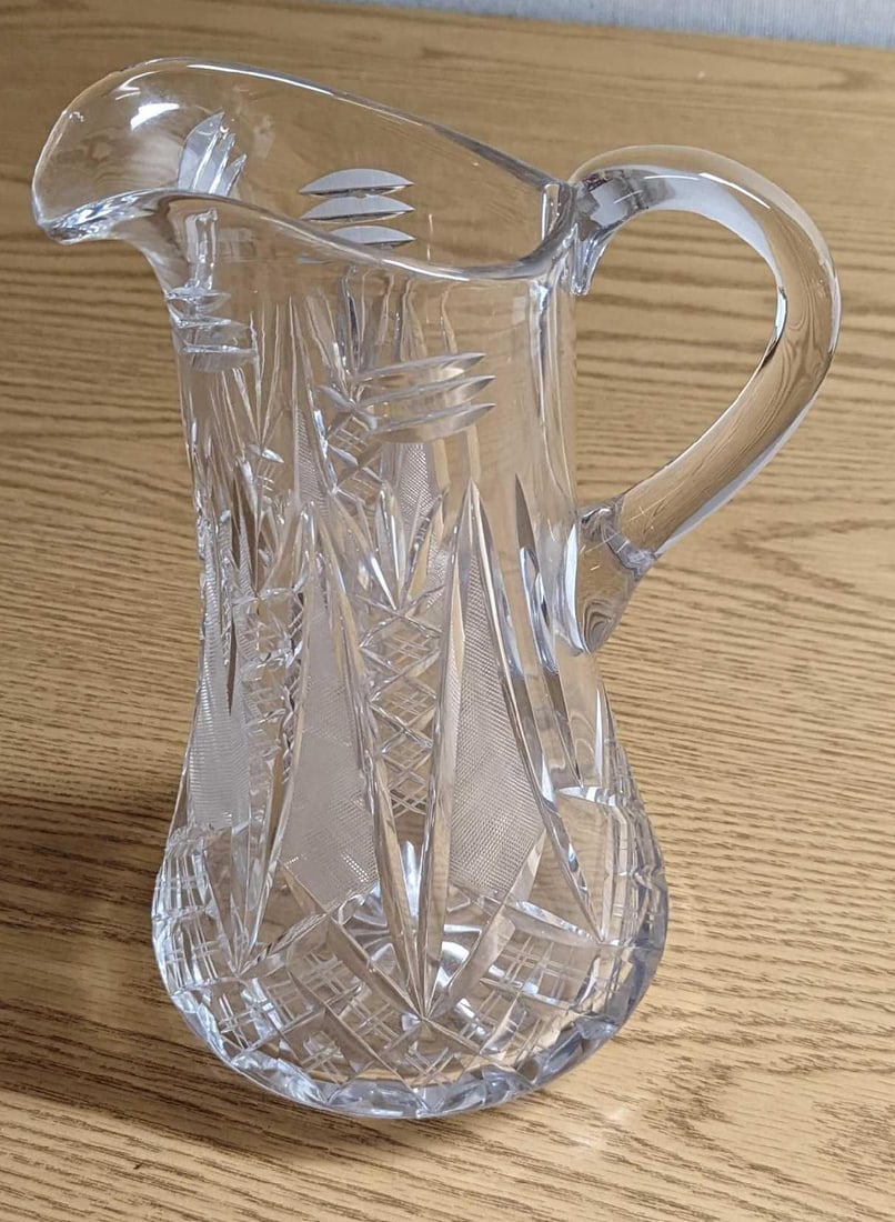 American Brilliant Cut Glass Pitcher: American Brilliant Cut Glass Pitcher. Is approx 6" x 6" x 11" and it weighs 4.69lbs. The pitcher is in good, vintage condition with some markings on the bottom, and some bubbles near the top. Please