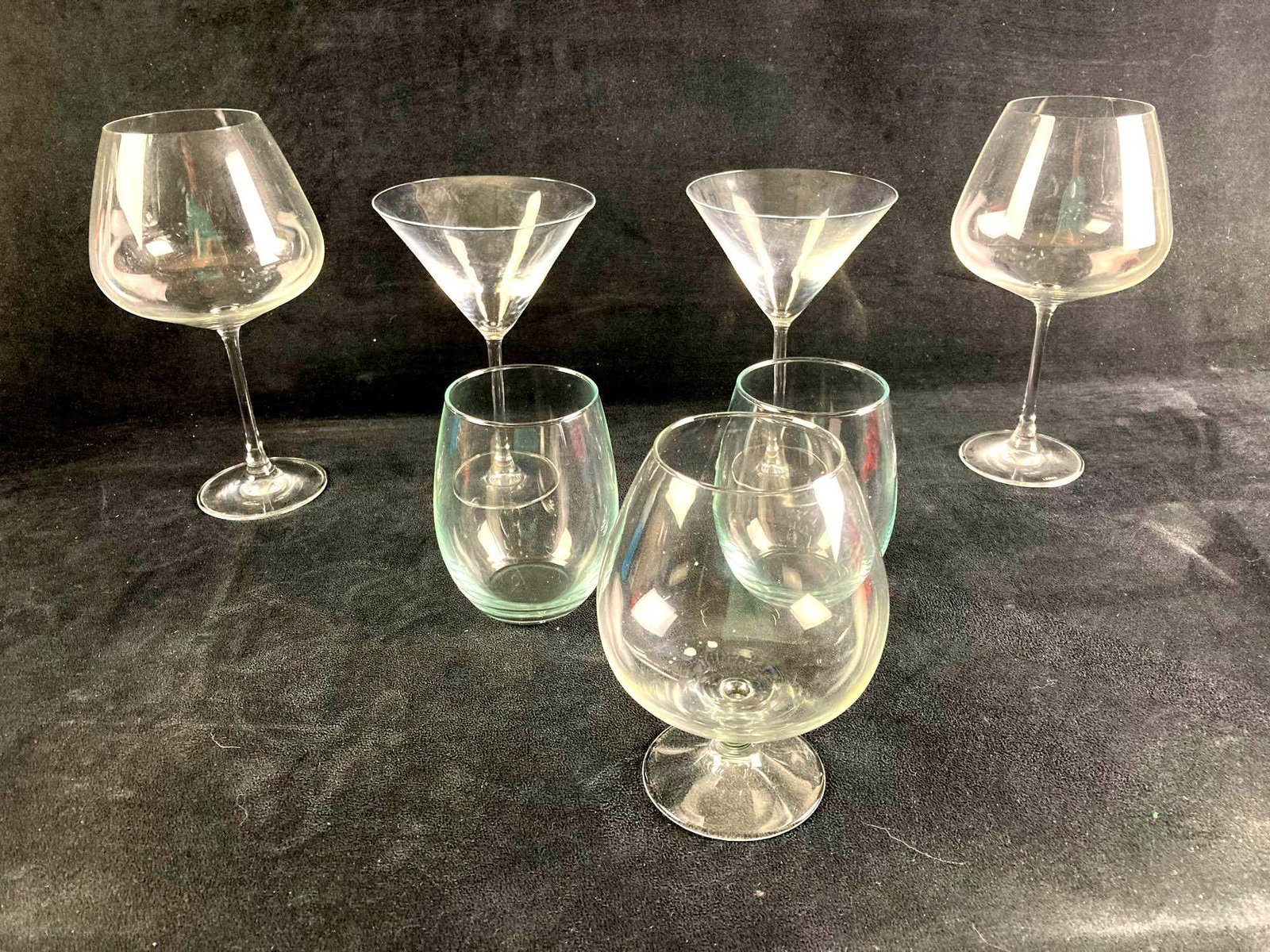 Set of (7) Drinking Glasses: Up for auction is a recent estate find, a set of (7) drinking glasses of various types.They range from martini glasses to Cognac glasses. This auction includes: (2) Martini Glasses (2) Wine Glasses