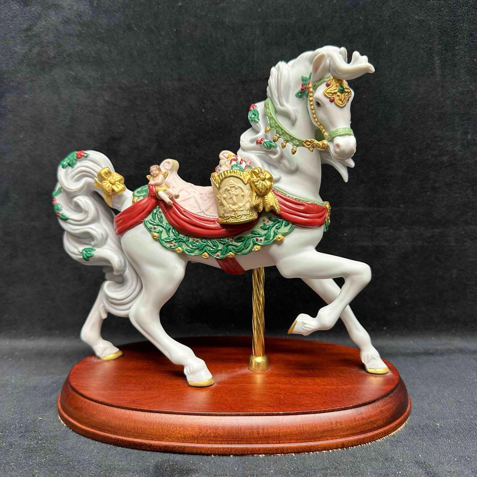 Lenox Christmas Carousel Horse 1994 Hand Painted Porcelain Art Sculpture Figure: Includes original Certificate of Authenticity. 1994 series edition. This collectible figurine is crafted from fine porcelain and meticulously hand-painted with accents of 24 karat gold. This item is