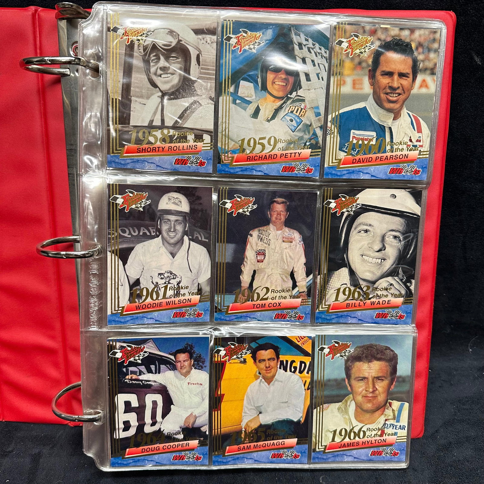 1993 Wheels NASCAR Racing Partial Card Set in Binder Rookies and Stars 135 Cards: Collection of 1993 Wheels NASCAR racing trading cards housed in a red Race Card Album three-ring binder with plastic sleeves. Includes a large run of cards featuring drivers, rookie of the year