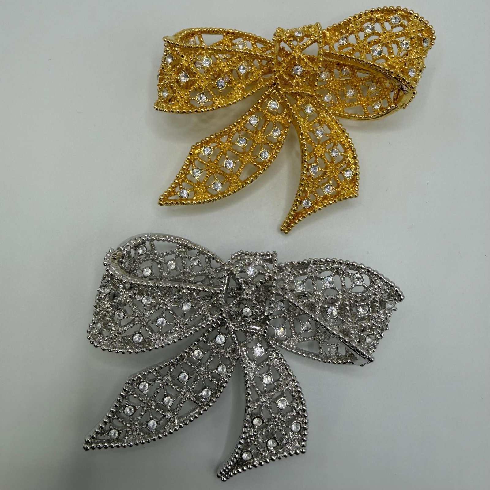 Kenneth Jay Lane Pair of Rhinestone Bow Brooches Gold and Silver Tone KJL (1 of 8)