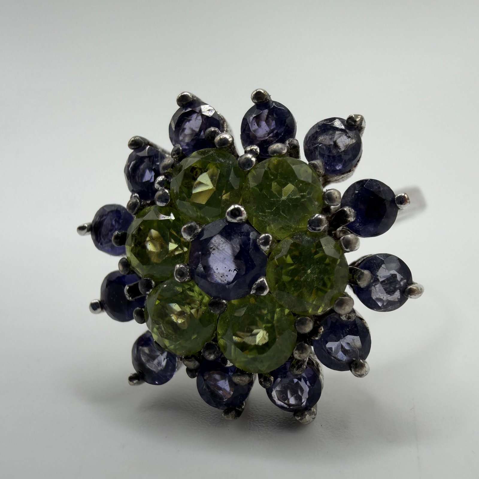 Cluster Cocktail Ring Sterling 925 Peridot and Tanzanite: This item is in pre-owned, previously used/displayed condition with noticeable light wear and surface scratches. Please reference all photos for full details. This piece of jewelry has been tested and