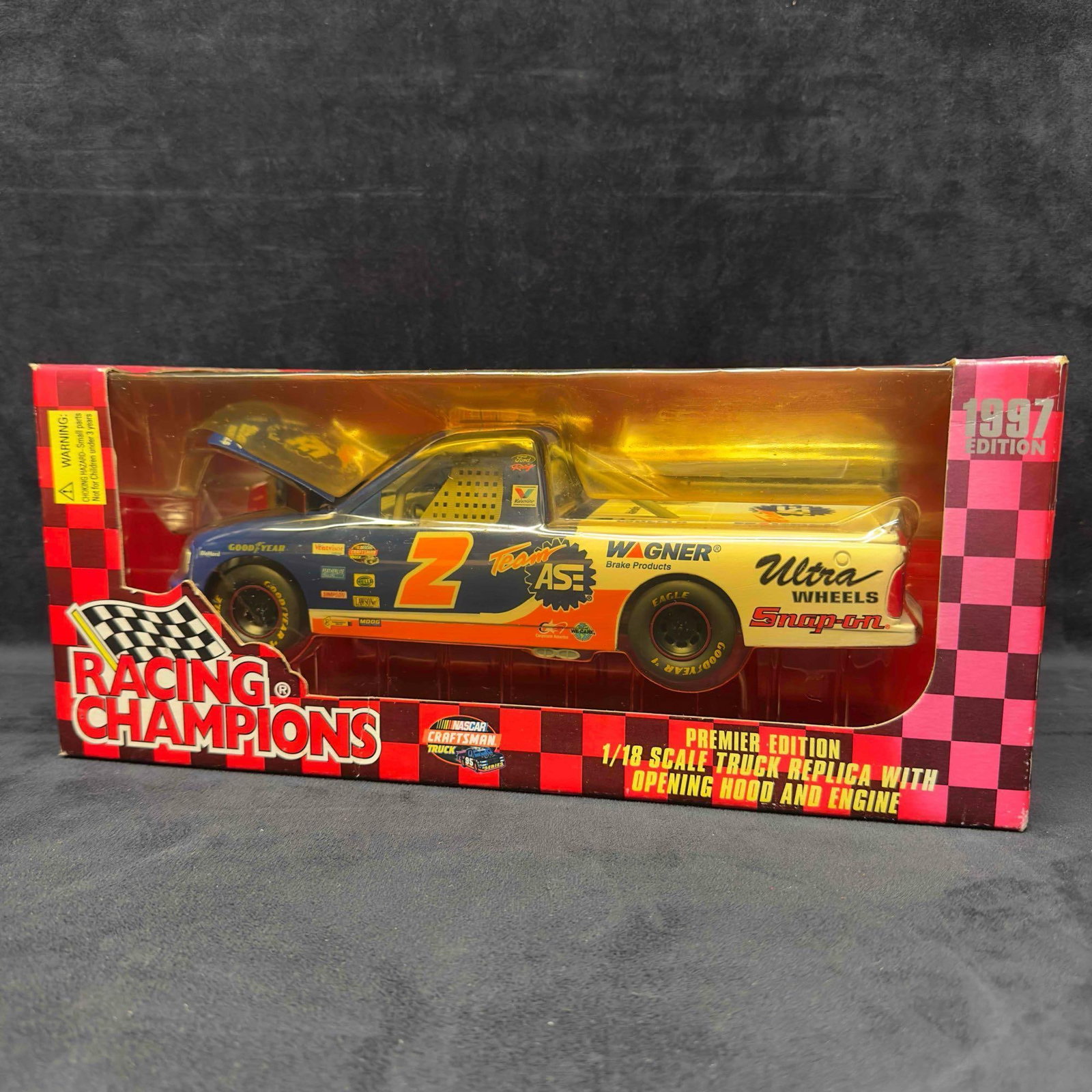 Racing Champions 1:18 Scale Truck Replica 1997 Premier Edition Team ASI: Racing Champions 1:18 Scale Truck Replica 1997 Premier Edition Team ASI. Sealed, like new with light wear on original outside package, the packaging shows wear with light discoloring. This item i