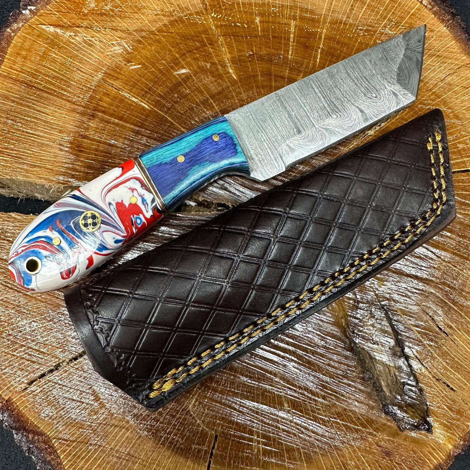 Blue Red White Swirl Colorway Design Handle MHS Cutlery Knife Cleaver Style Blade P86: Fixed small, cleaver-style blade knife by MHS Cutlery featuring a layered patterned steel straight back blade and decorative spine work. The handle features a contoured, wood/epoxy resin-style gr