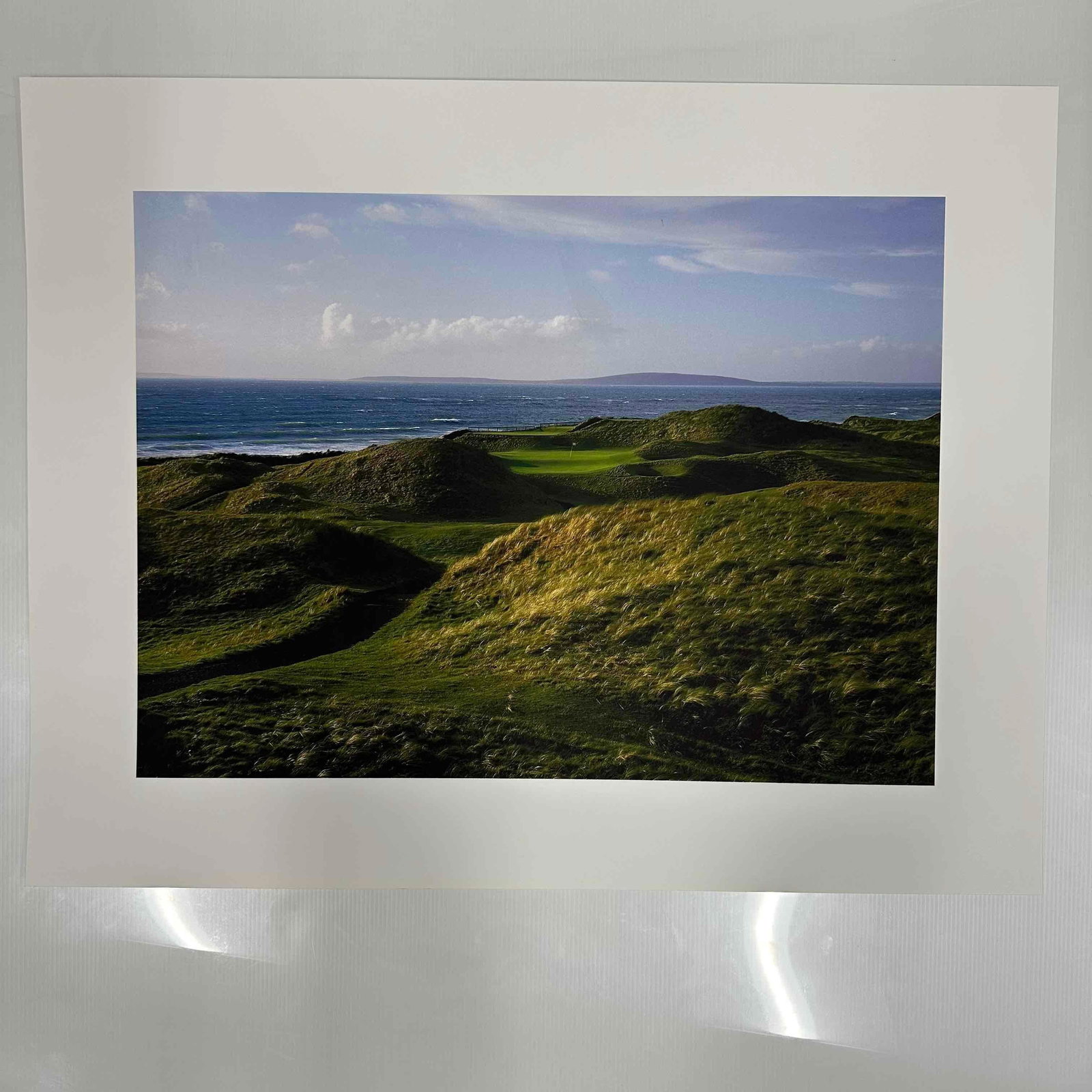 Coastal Links Golf Course Landscape Photography Print: Vibrant color photograph print of a coastal links-style golf course with rolling grassy dunes and ocean backdrop. This item is in pre-owned previously stored condition, showing light surface wear