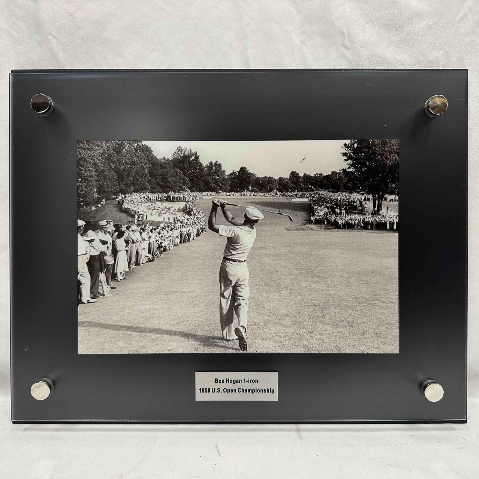 Ben Hogan 1950 U.S. Open 1-Iron Shot Printed Acrylic Plaque: Striking black-and-white image of Ben Hogan’s legendary 1-iron approach on the 72nd hole of the 1950 U.S. Open at Merion Golf Club, printed directly on a rigid acrylic plexi glass panel. Mounted