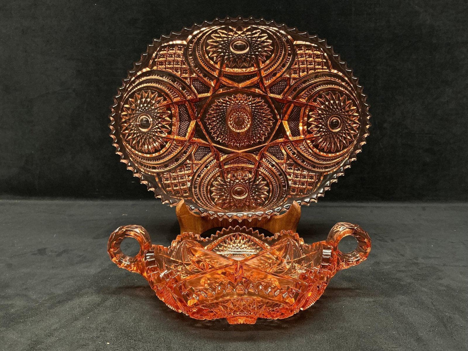 1920s to 30s Imperial Glass Co Marigold Star and Fan Crystal Cut Pattern Platter and Divided Dish: This lot contains two (2) pink/rose gold (often referred to as Marigold) pieces from the Imperial Glass Company. Both are heavy glass dishes with the manufacturer's commonly identifiable star and 