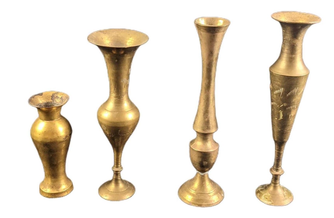 Four Vintage Brass Bud Vases: Four Vintage Brass Bud Vases. Their makers or date of creation is unknown. Vases start at approx 4" tall for the shortest and approx 7" for the tallest. Vases are in a good, vintage condition with