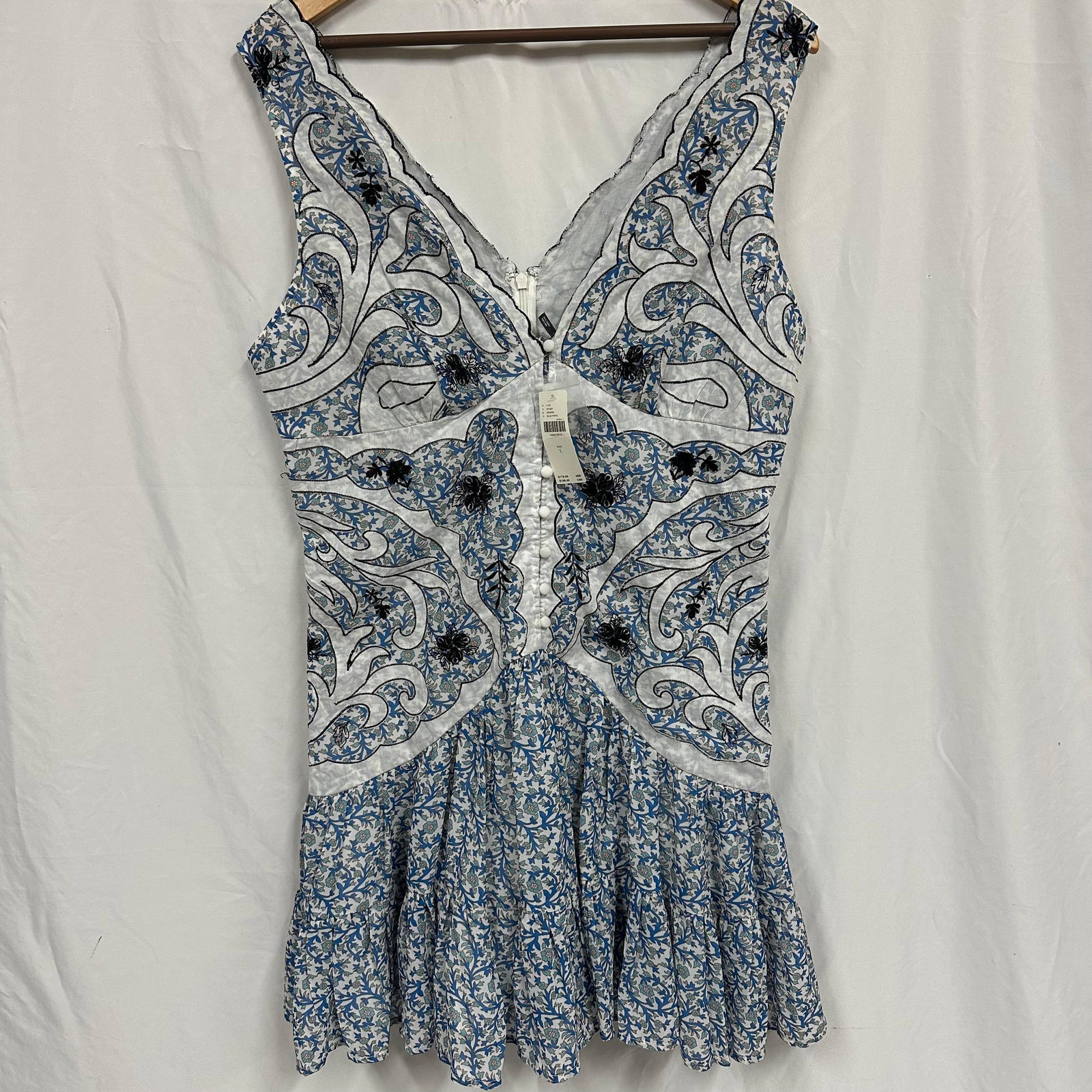 Anthropologie Women Sleeveless Embroidered Blue and White Dress Size L: Original tag still intact. Outfit appears clean and in good, like-new condition with light wrinkling consistent with wear and storage. No major stains, tears, or damage observed. Please reference all 