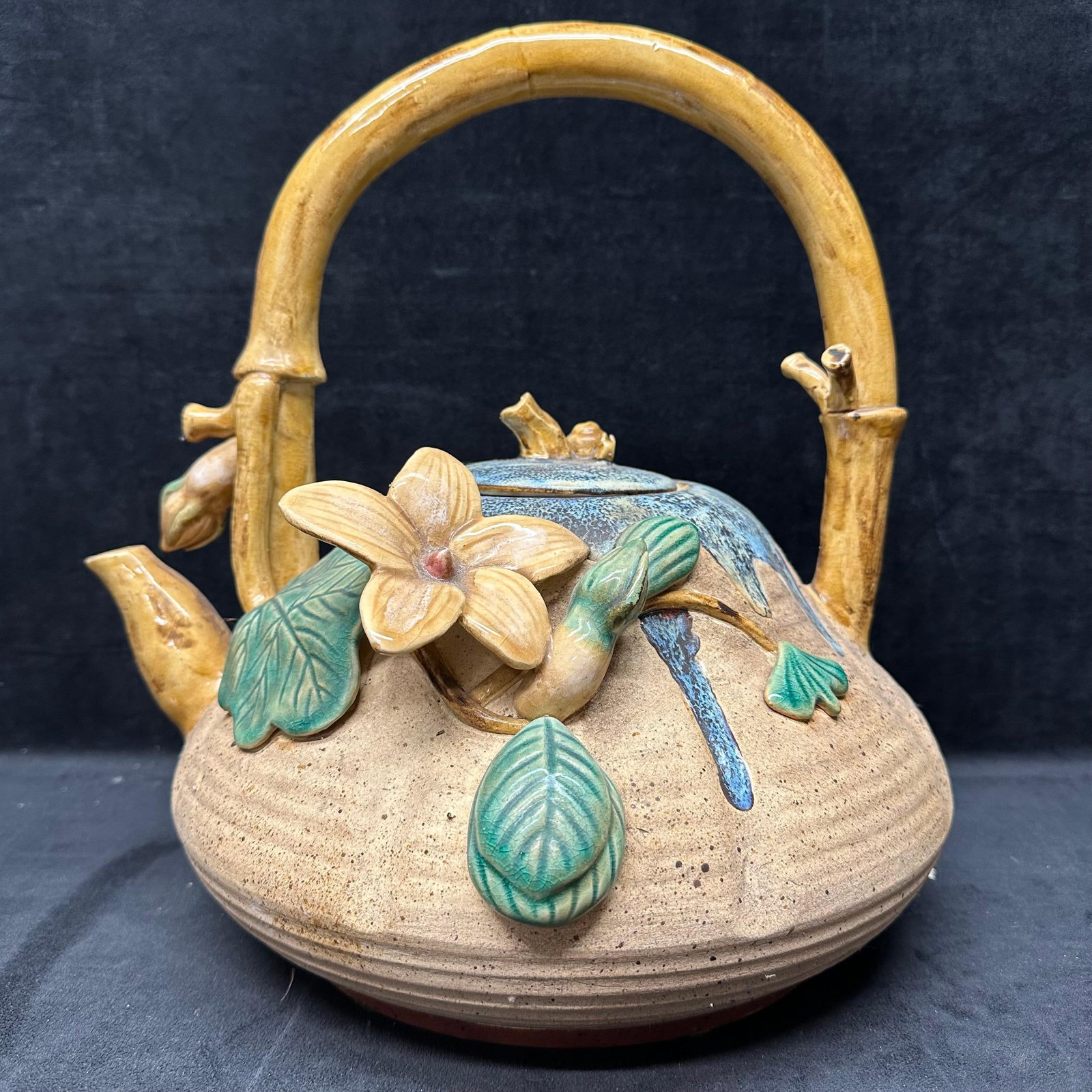 Oriental Accent Ceramic Teapot Sculptural Floral Bamboo Handle Decorative: Decorative ceramic teapot with sculptural floral and leaf design and bamboo form handle. Marked Oriental Accent Made in China on the underside. Includes lid. Intended for decorative use only, not for