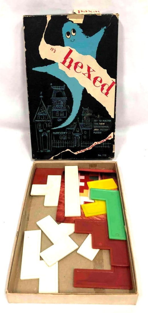Vintage Jinx Jigsaw Puzzle "It's Hexed": This lot contains a vintage Jinx Jigsaw Puzzle "It's Hexed". This puzzle comes in its original box. The box is approx 5 3/4" x 9" x 1" and together the puzzle and box weigh about 0.3lbs. Overall the