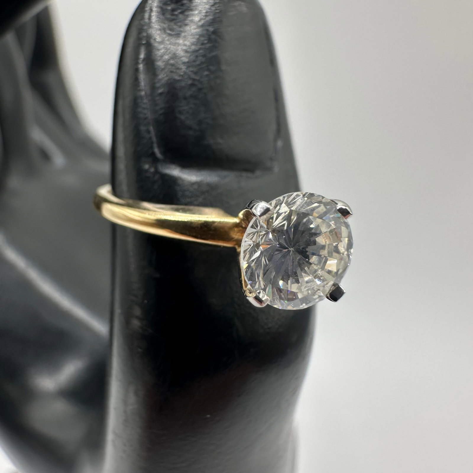 14K Yellow Gold Engagement Ring Round Cut CZ Four Prong Setting: This item is in good pre-owned, previously used/displayed condition with noticeable light wear and surface scratches. Please reference all photos for full details. This piece of jewelry has been
