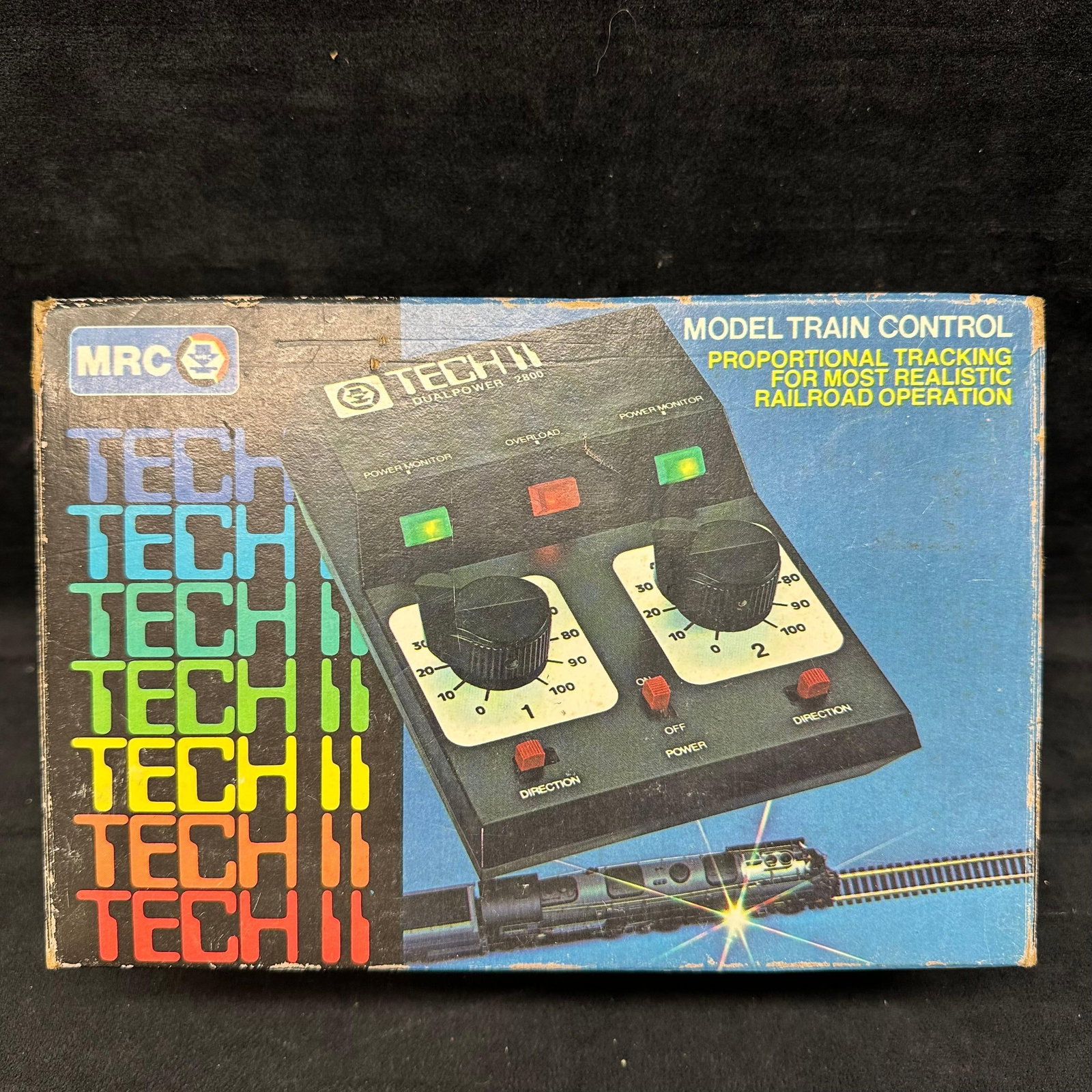 MRC Tech II Dual Power 2800 Model Railroad Transformer Power Pack Control Box: MRC Dual Power 2800 TECH II Model Train Control. This comes with the original box and paperwork. This item is in good pre-owned, previously used/displayed condition with noticeable light wear
