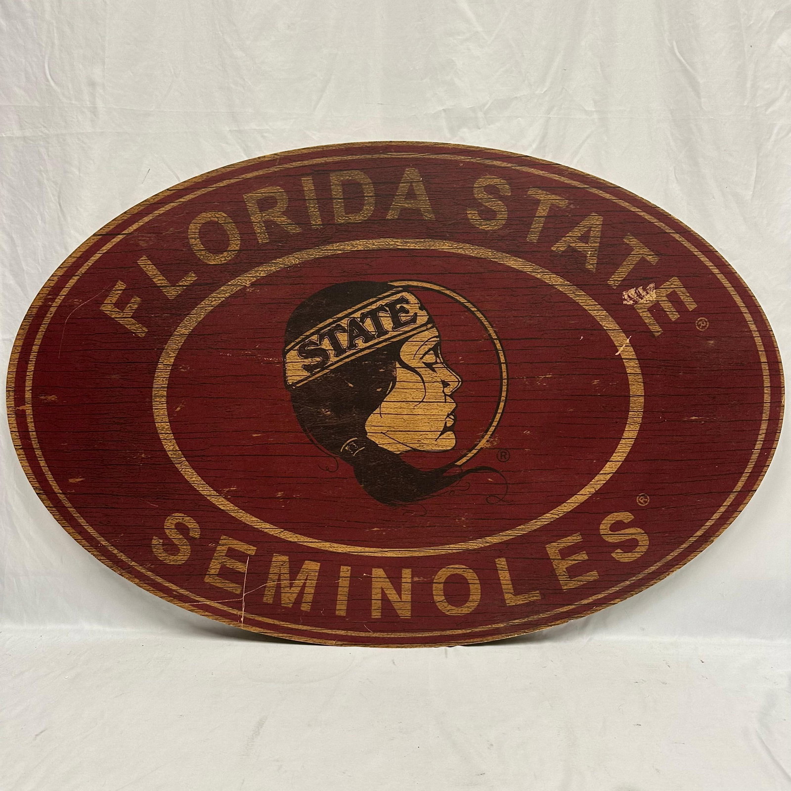 Florida State Seminoles Heritage Oval Wall Sign Large Vintage Style: Fan Creations Florida State 46" Heritage Logo Oval wall sign. Tag and hallmark on the back, with a hang wire. This item is in good pre-owned, previously used/displayed condition with noticeable li