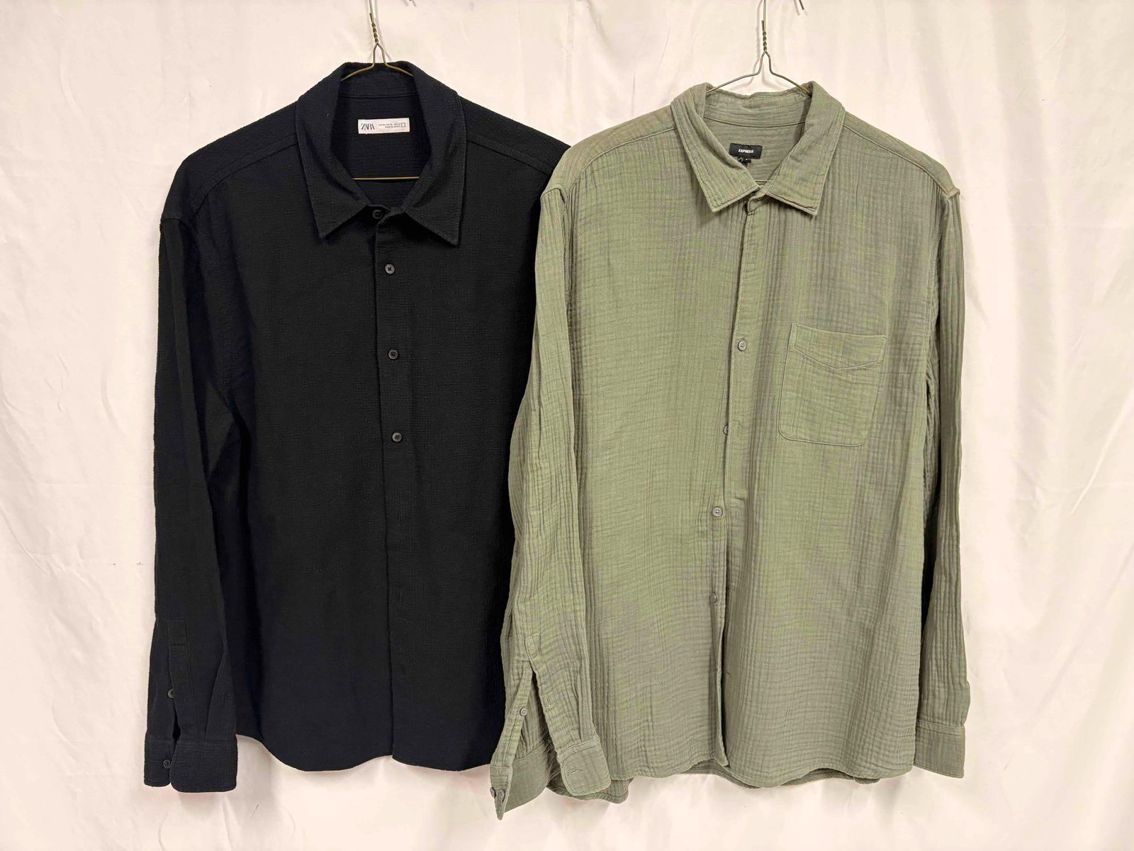 2PC Express and Zara Mens Long Sleeve Textured Sweater Bundle: This lot contains a set of men's short sleeve dress shirts. Both the Express and Zara shirts stand in like-new conditions without tags. Please refer to images for further context on the shirt'