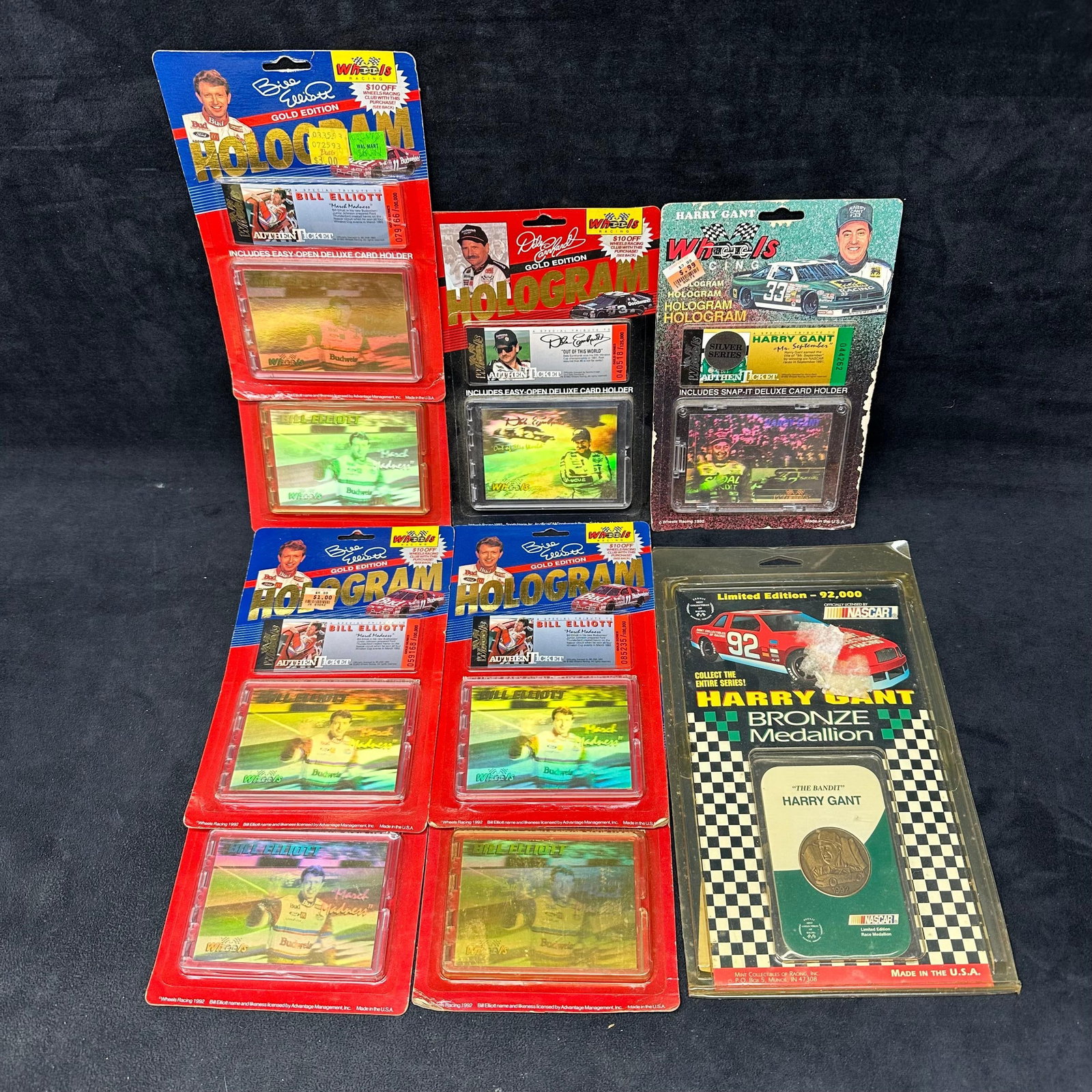 8 NASCAR Wheels Racing Hologram Cards and Harry Gant Bronze Medallion Bill Elliott Dale Earnhardt: Group lot of 1992 Wheels Racing hologram collectibles and one limited edition NASCAR bronze medallion. Includes: (5) Bill Elliott Gold Edition Hologram cards (sealed on original cards) (1) Dale Earnha