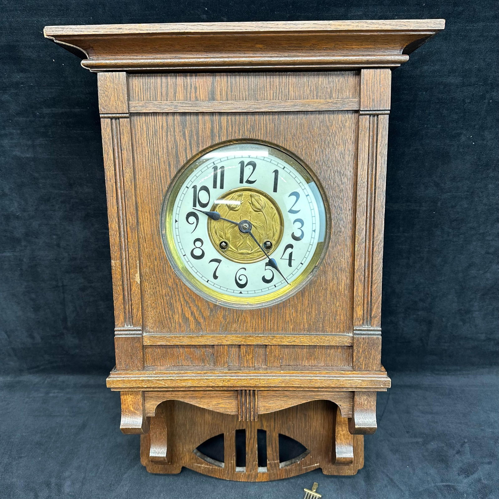 Antique Gustav Becker GW Art Nouveau Wall Clock with Ornate Brass Pendulum: Antique late 19th / early 20th century Gustav Becker (GW hallmark) wall clock with a solid oak case in strong Art Nouveau style. The enamel dial features bold Arabic numerals and a decorative gilt cen