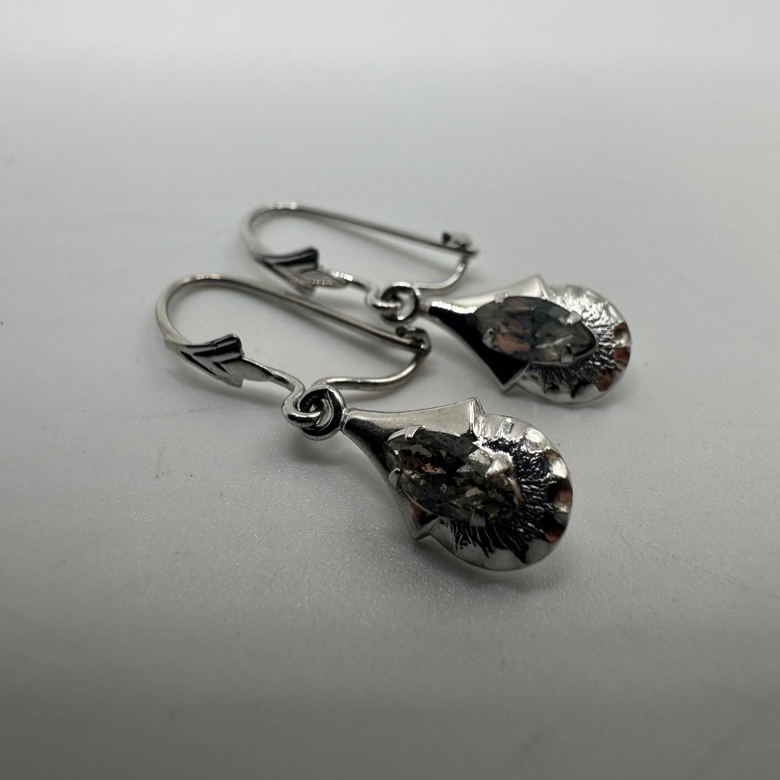 Dangle Teardrop Style 14K White Gold CZ Stone Earrings: This item is in good pre-owned, previously used/displayed condition with noticeable light wear and surface scratches. Please reference all photos for full details. This piece of jewelry has been teste