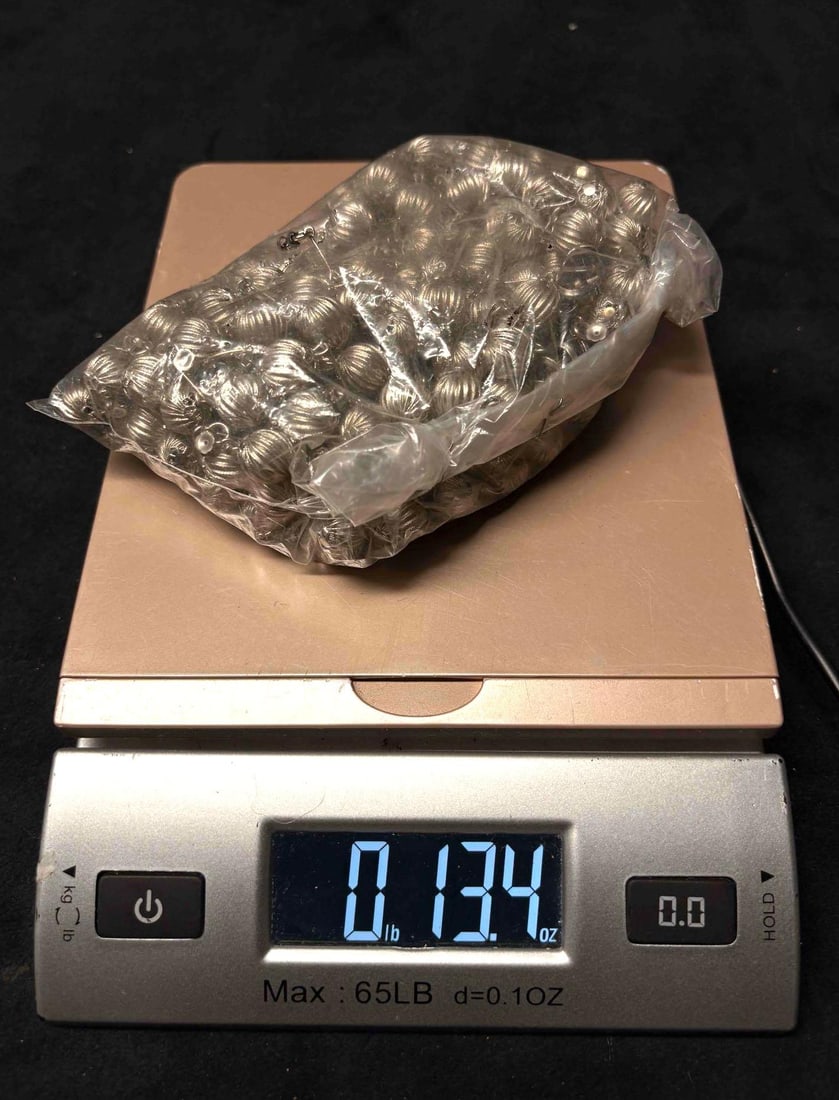 10 Plus Ounces of Silver Toned Textured Costume Jewelry Beads: This lot contains over 13 ounces of silver-toned beads. This goodie bag is intended for crafters and artists. APPROX WEIGHT: 13.4 OZ