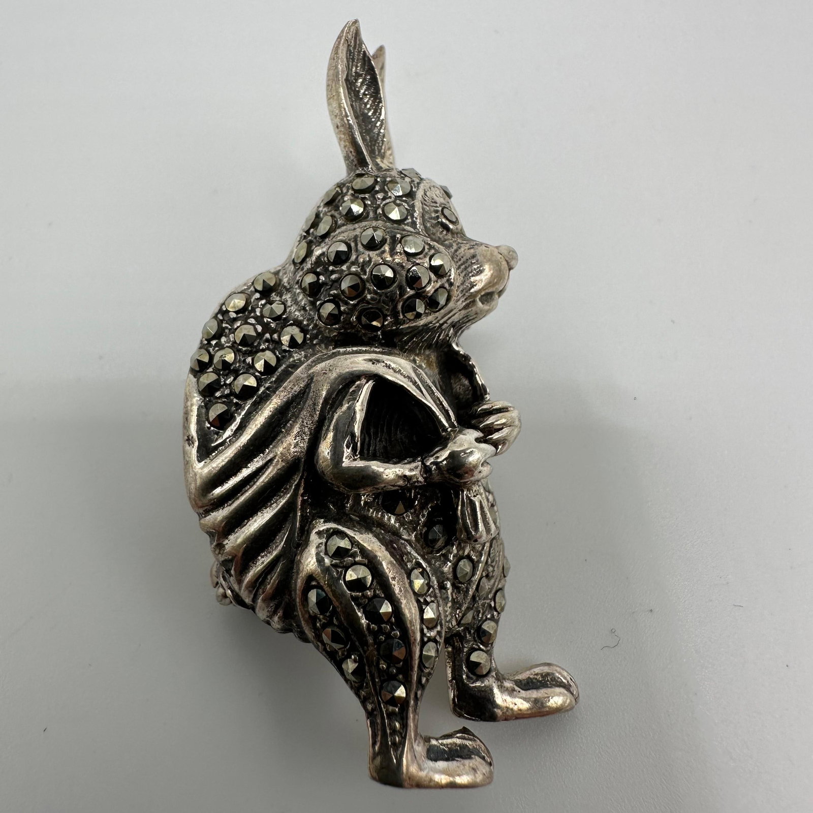 Marcasite Encrusted Silver Rabbit Brooch Pin R2: This item is in good pre-owned, previously used/displayed condition with noticeable light wear and surface scratches. Please reference all photos for full details. This piece of jewelry has been