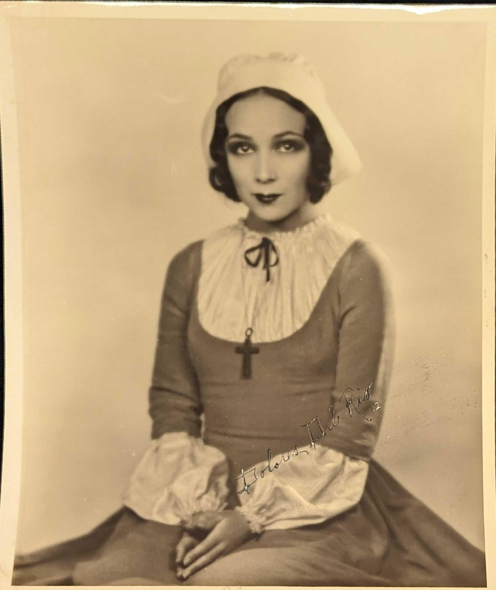 Autographed Dolores Del Rio Publicity Photo: Autographed Dolores Del Rio Publicity Photo. The photo appears to be from the movie, "Madame Du Barry". This photo is approx 8" x 10" and it weighs 0.03lb. The photo has some creases