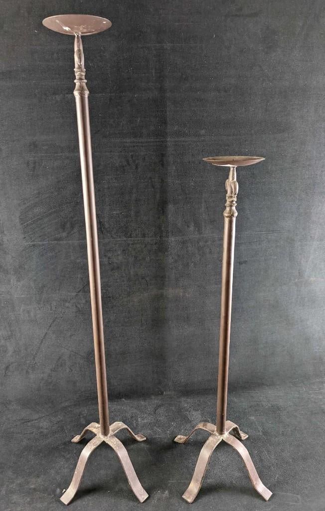 2 Home Interior Design Metal Floor Candle Holders: 2 Home Interior Design Metal Floor Candle Holders. The tall one is approx 8" x 8" x 39". The smaller one is approx 8" x 8" x 30". Together they weigh 6lbs. Both are in good, used condition with signs 