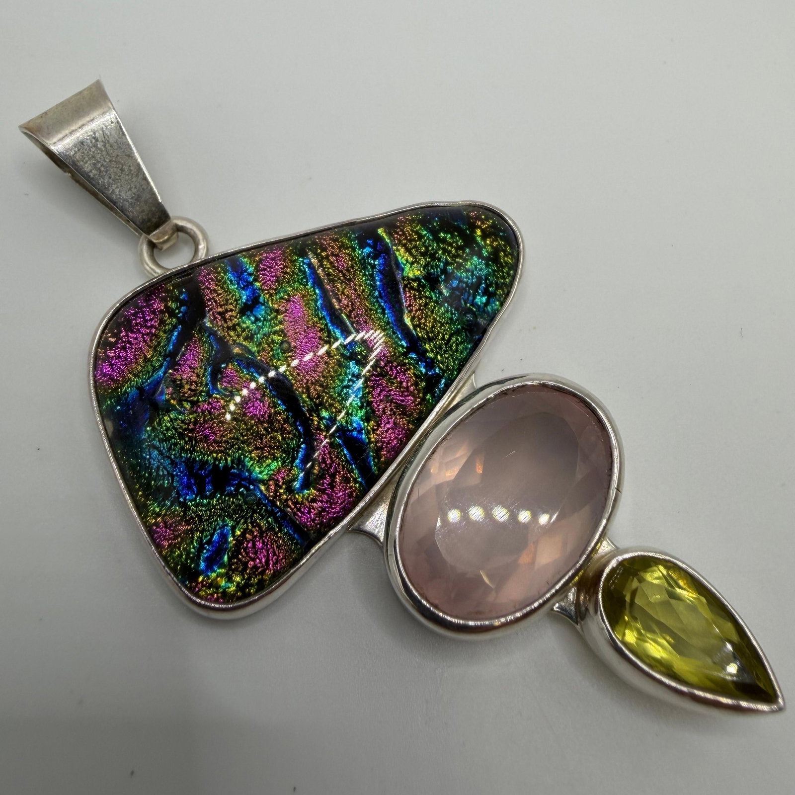Charles Albert Dichroic Glass Faceted Green and Pink Stone Sterling Jewelry Pendant: This item is in pre-owned, previously used/displayed condition with noticeable light wear and surface scratches. Please reference all photos for full details. This piece of jewelry has been tested and