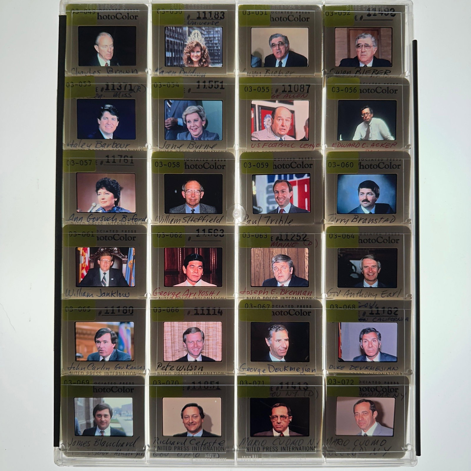 Political Press Photo Slide Transparency Archive Public Officials Mario Cuomo: Collection of vintage color press photo slide transparencies featuring various American political figures and public officials, including Haley Barbour, Richard Celeste, Pete Wilson, George Deukmejian