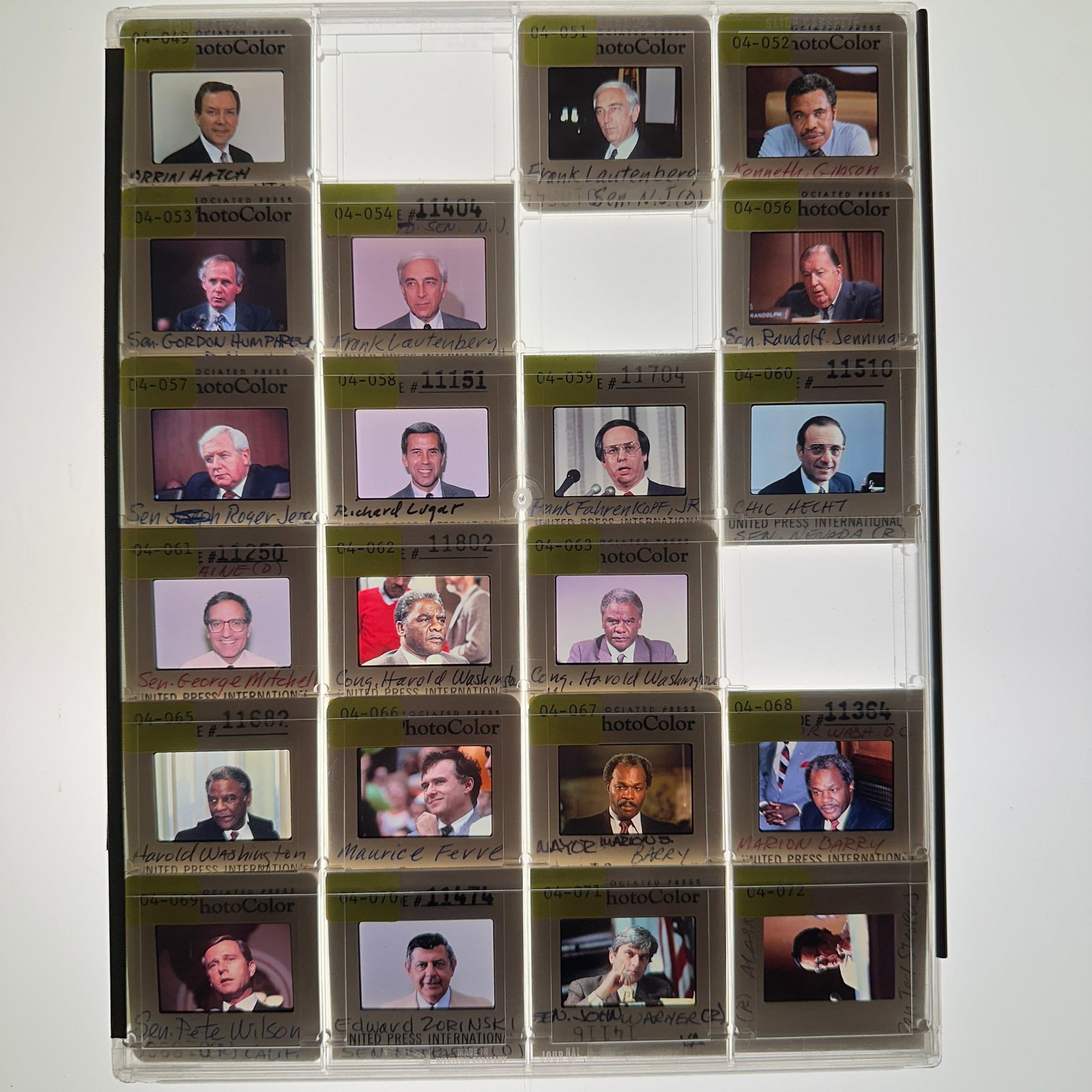 US Senate and Political Press Photo Color Slide Transparency Collection: Collection of vintage color press photo slide transparencies featuring U.S. senators, congressmen, and political figures, including Orrin Hatch, Richard Lugar, Gordon Humphrey, George Mitchell, Chic H