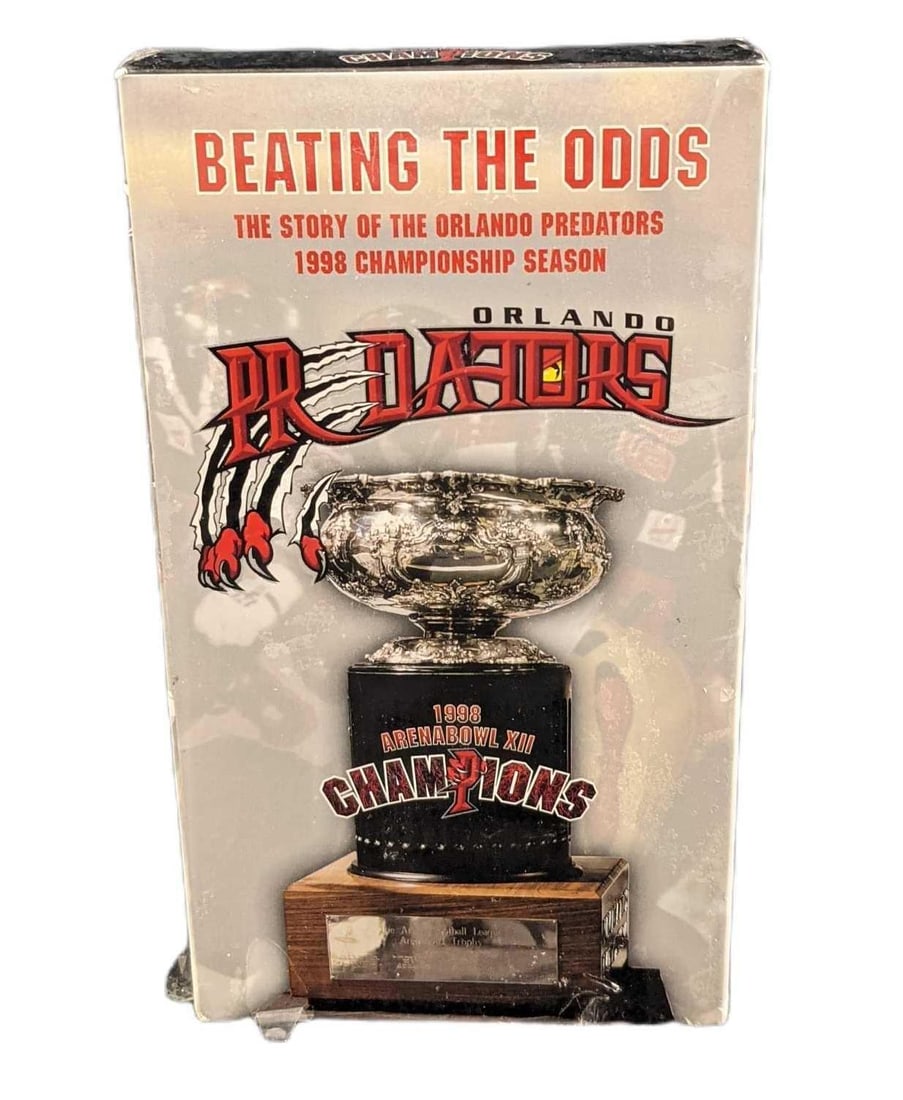 Rare Unopened VHS Beating The Odds Predators Football Documentary: Beating The Odds: The Story Of The Orlando Predators 1998 Championship Season VHS. Documentary about the Arena Football Team's 1998 Season. Unopened. Is approx 4 1/8" x 1" x 7 1/2".