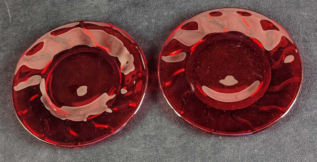 2 Vintage Retired Jamestown Ruby Glass Luncheon Plates: Two Vintage Retired Jamestown Ruby Glass Luncheon Plates. The "Jamestown Ruby" design was released from 1964 - 1982. The plates are approx 8 1/4" and weigh 2.5lbs. They are in a good, used condit