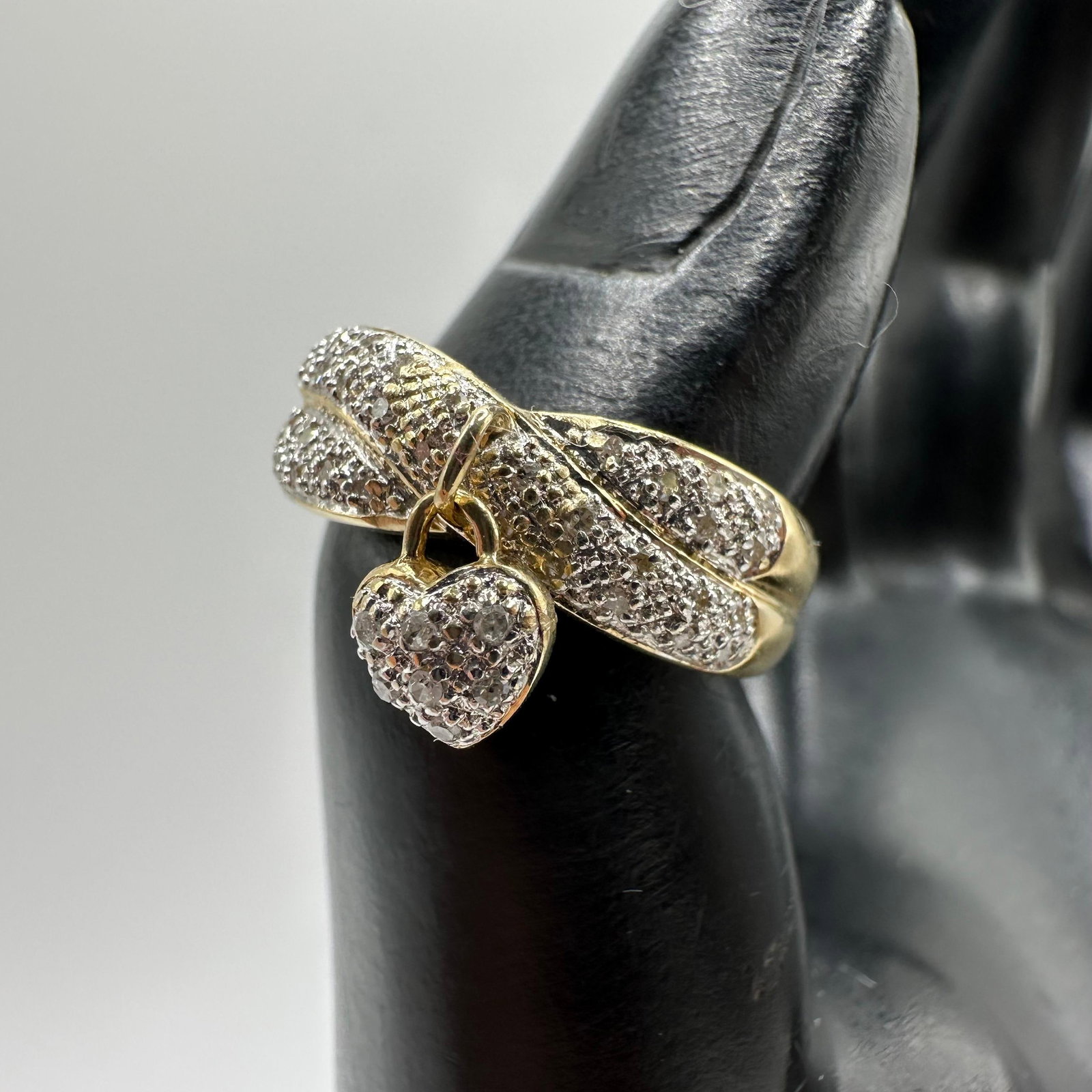 Accent Diamond 14K Yellow Gold Dangle Heart Ring W94: This item is in good pre-owned, previously used/displayed condition with noticeable light wear and surface scratches. Please reference all photos for full details. This piece of jewelry has been