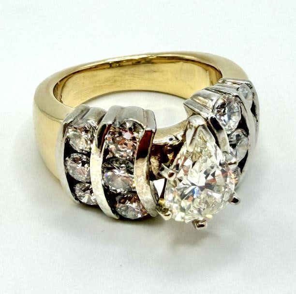 14k Gold 1.5 ct Pear Shaped Diamond Engagement Ring: This piece of jewelry has been tested and researched prior to listing. Please view all our pictures they are part of our description. DETAILS: Metal - 14k Gold Color - Gold Stones - 1 Pear Diamond Cen