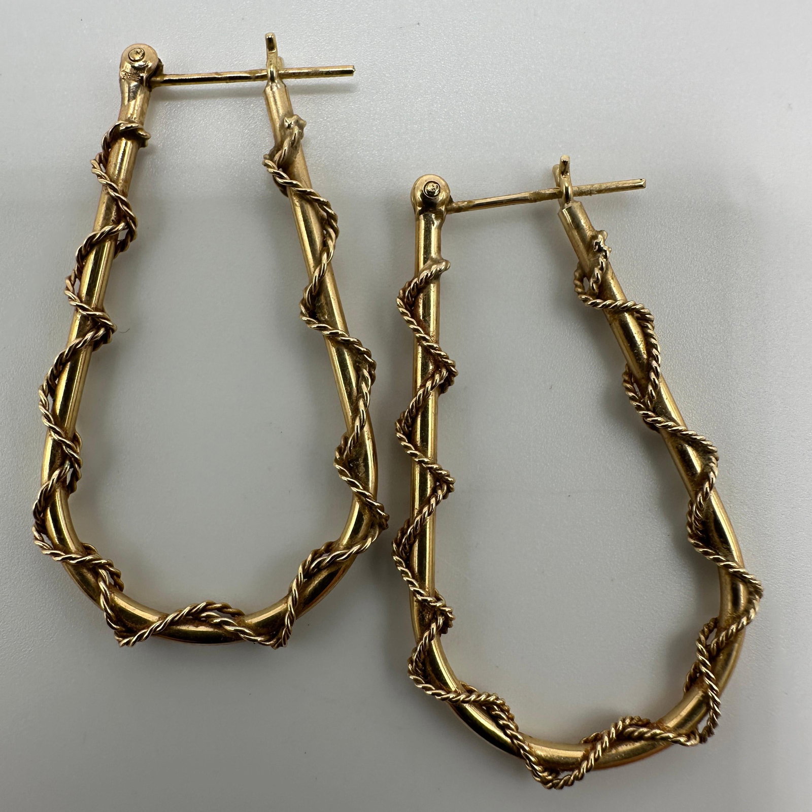 Rope Twist Accent Wrapped Tube Hoop Earrings 14k Gold: This item is in good pre-owned condition, previously used/displayed, with noticeable light wear and surface scratches. Please reference all photos for full details. This piece of jewelry has been care