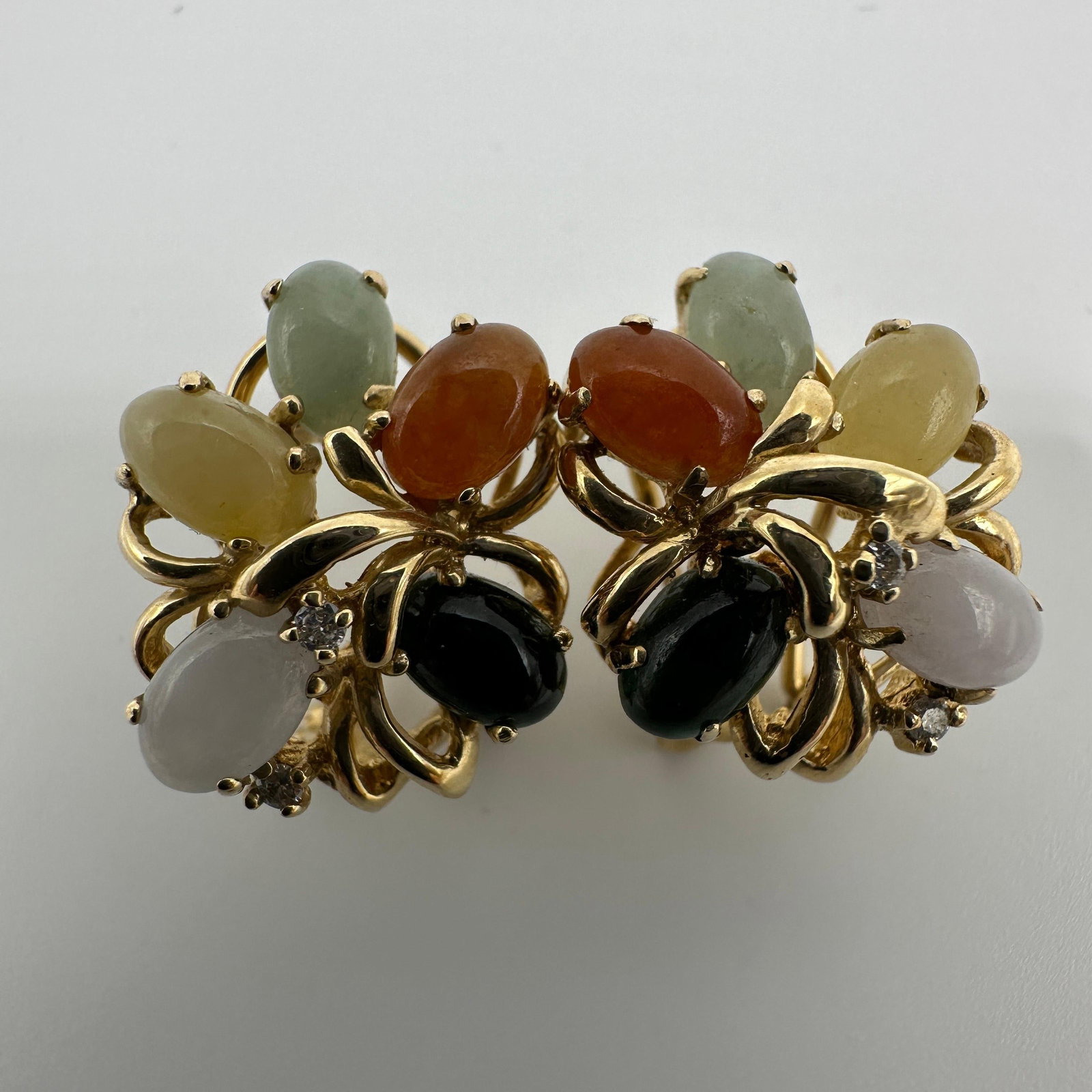 14K Yellow Gold Multicolor Jadeite Stone Earrings Clip On: This item is in good pre-owned condition, previously used/displayed, with noticeable light wear and surface scratches. Please reference all photos for full details. This piece of jewelry has been care