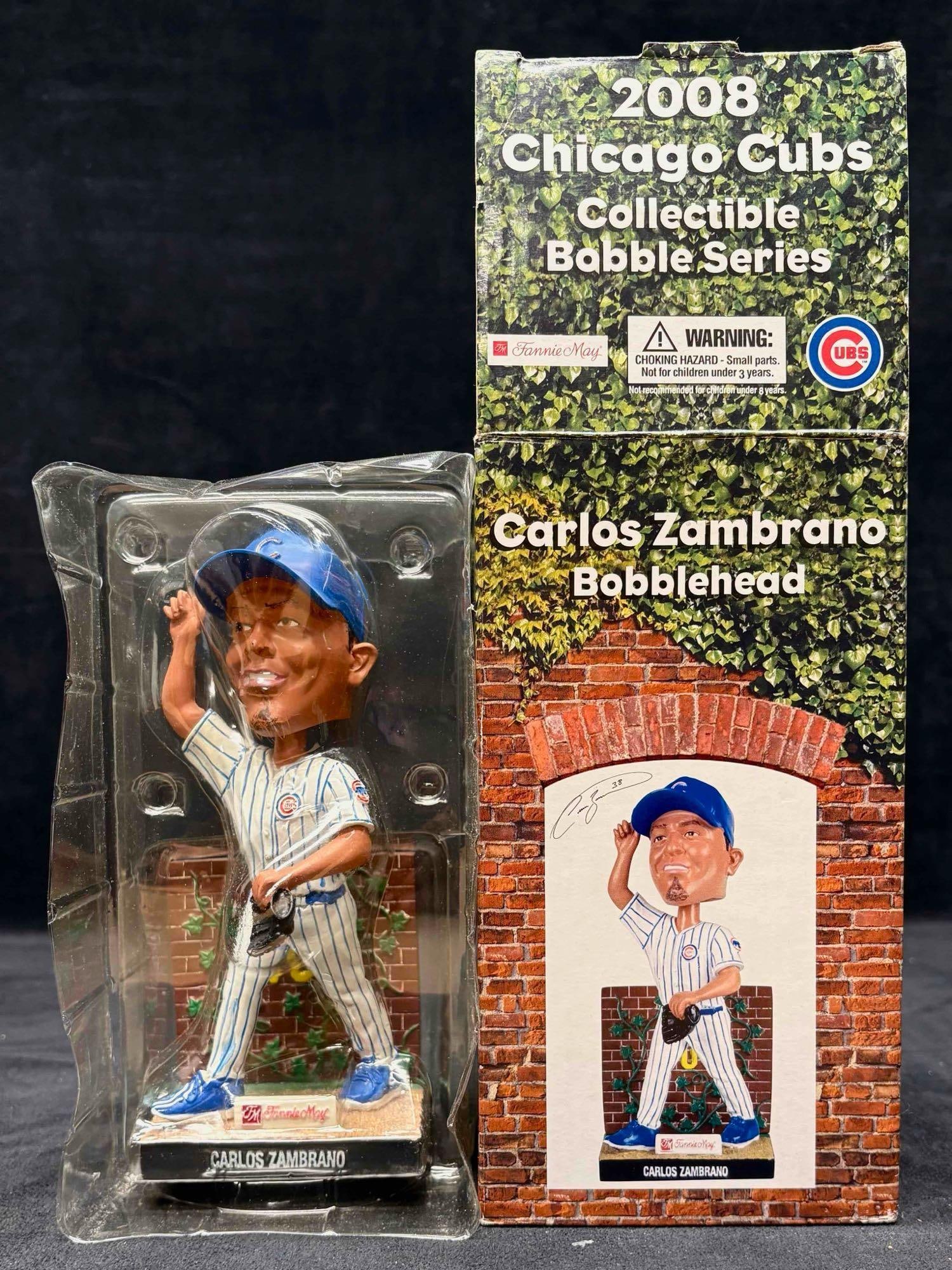 Carlos Zambrano Chicago Cubs 2008 Autographed Bobblehead: This lot contains Fannie May's 2008 collaboration with the Chicago Cubs. This bobble head depicts baseball player Carlos Zambrano, still sitting within its original packaging. The figure itself is