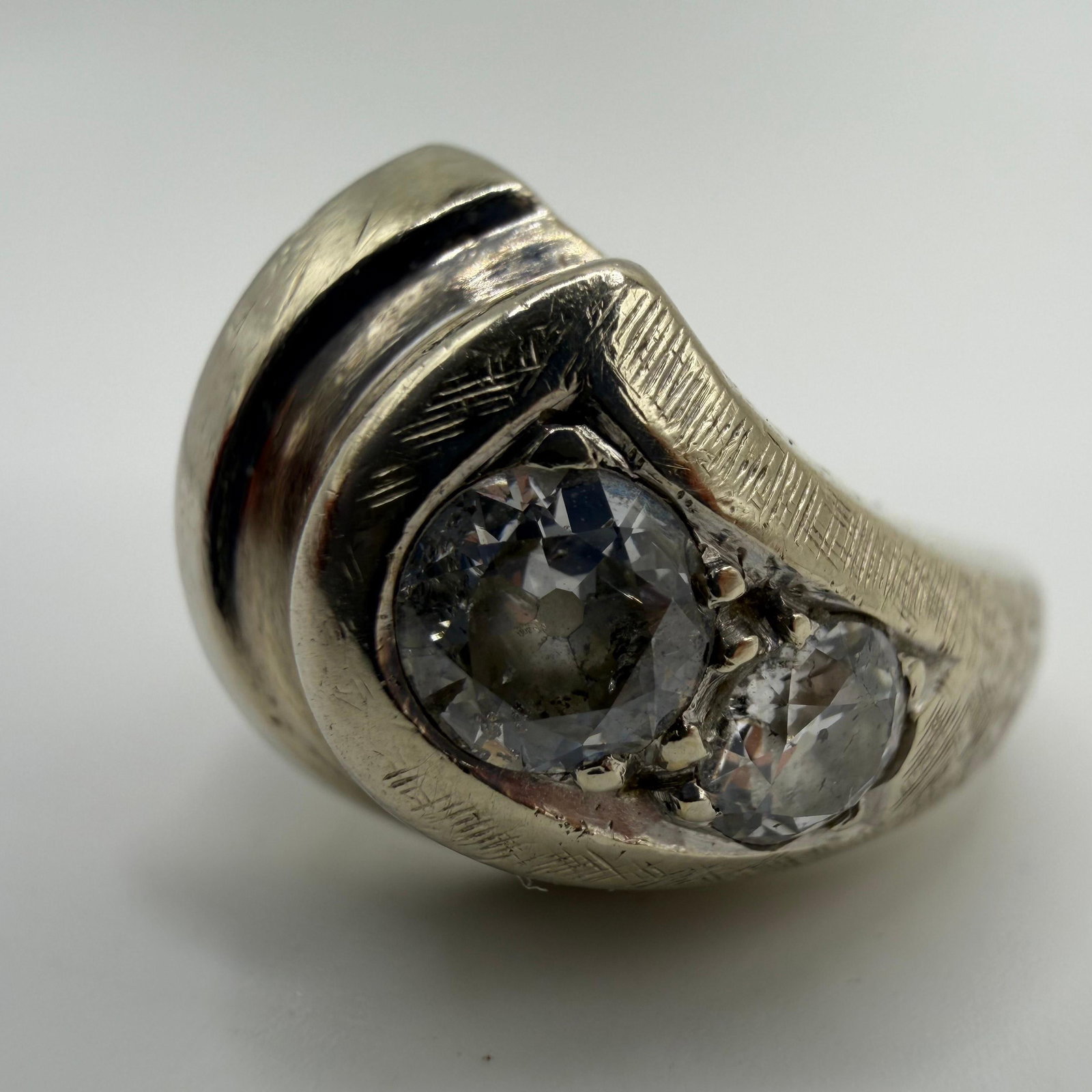 14K White Gold Two Diamond Ring: This item is in good pre-owned condition, previously used/displayed, with noticeable light wear and surface scratches. Please reference all photos for full details. This piece of jewelry has been care