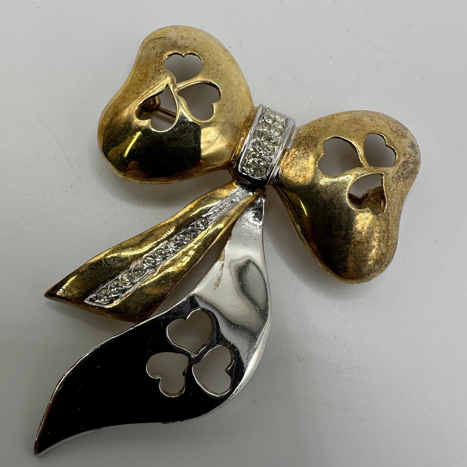 Gold Plated Sterling CZ Bow Ribbon Brooch A33: This item is in good pre-owned, previously used/displayed condition with noticeable light wear and surface scratches. Please reference all photos for full details. This piece of jewelry has been caref