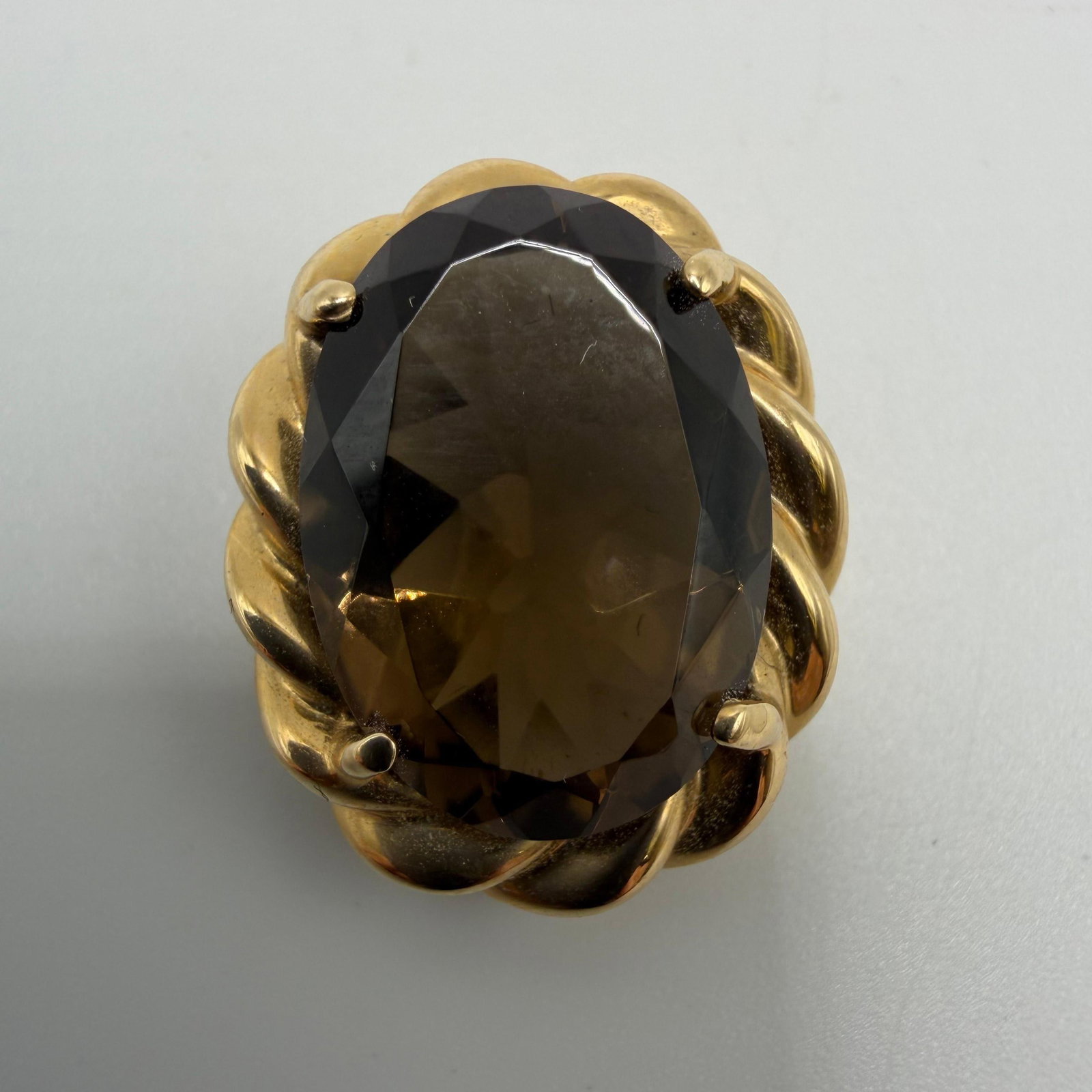 Oval Cut Smoky Quartz Yellow Gold 14K Pendant: This item is in good pre-owned condition, previously used/displayed, with noticeable light wear and surface scratches. Please reference all photos for full details. This piece of jewelry has been care