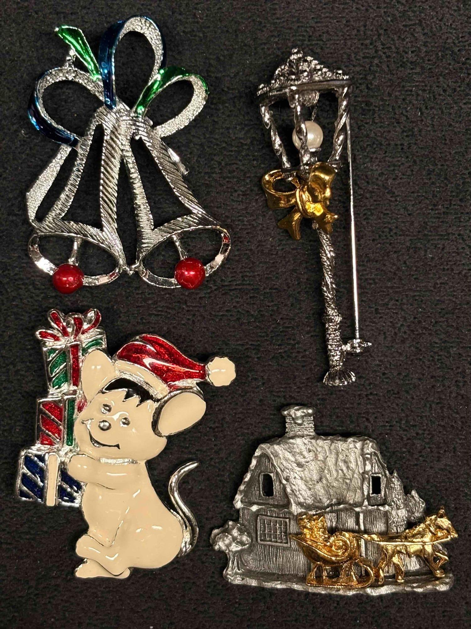 4pc Silver Tone Holiday Brooches Collection featuring Jewelry Brand GERRYS: This lot includes four (4) silver-toned enamel brooches, featuring GERRY'S Christmas Bells brooch. Each piece is in like-new conditions with little to no visible/noticeable flaws. Please refer to 