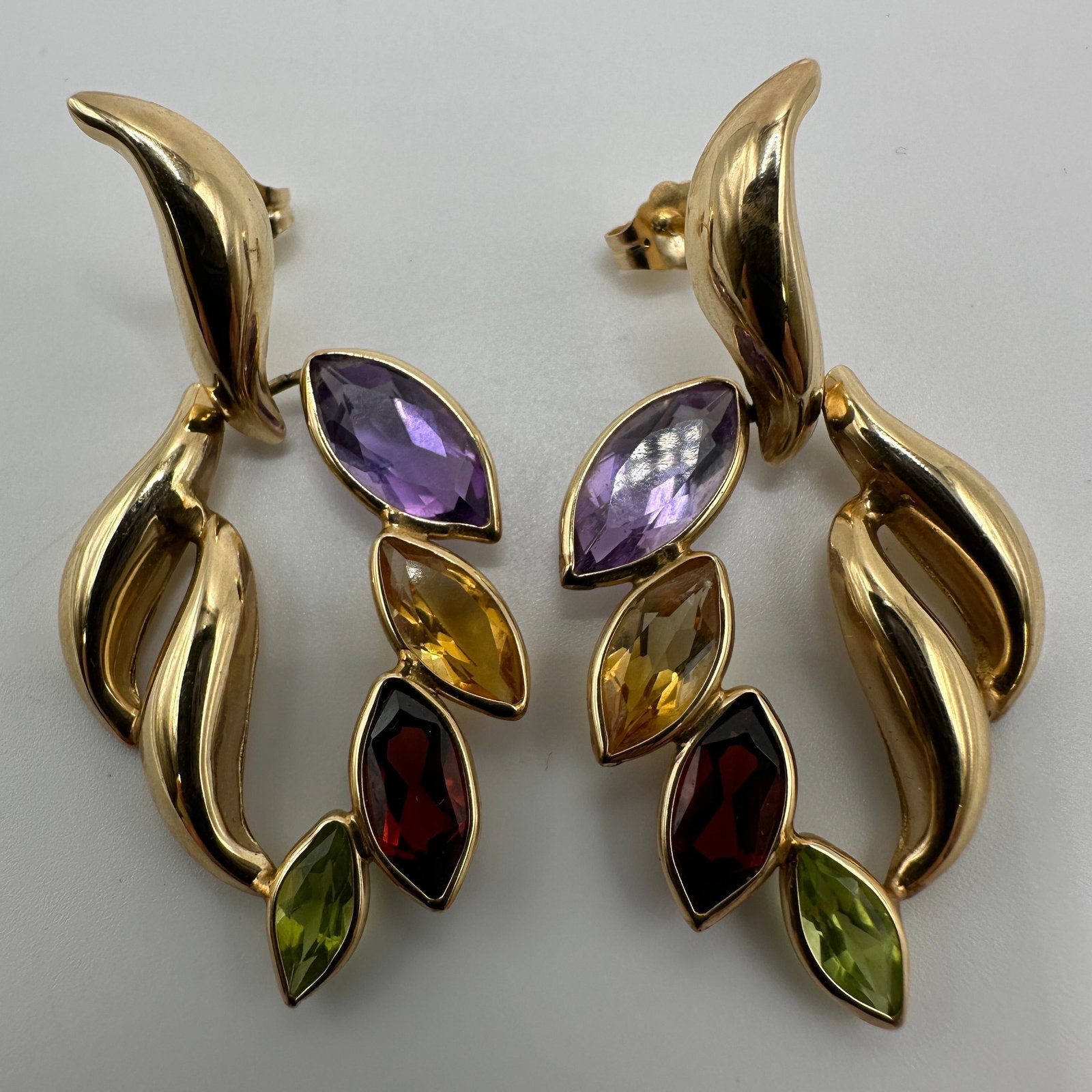 Marquise Cut Multi Gemstone 14K Gold Dangle Earrings: This item is in good pre-owned condition, previously used/displayed, with noticeable light wear and surface scratches. Please reference all photos for full details. This piece of jewelry has been care