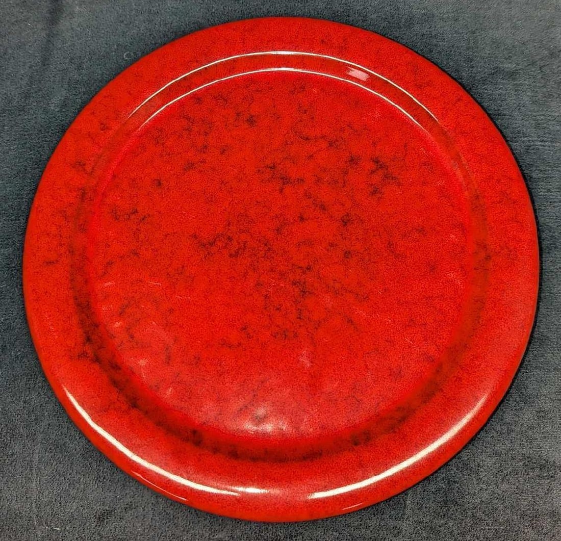 12" Handmade Red Ceramic Platter A: 12" Handmade Red Ceramic Platter A. This is approx 12" x 12" x 1" and it weighs 2.43 lbs. The platter has some light scratches. The bottom of the plate was signed by the artist. 