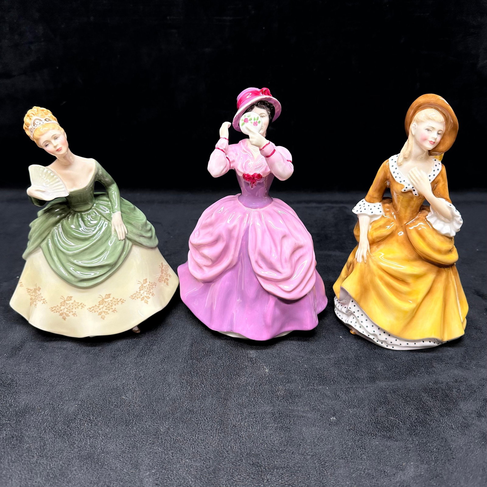 Royal Doulton Figurines Soiree HN2312 Lady Pamela HN2718 Signed and Sandra HN2275 Three Figure Lot: This lot includes three vintage Royal Doulton porcelain figurines: Soiree HN2312 in green with fan, Lady Pamela HN2718 in pink (bearing a handwritten dedication dated 6 May 1978 on the underside)