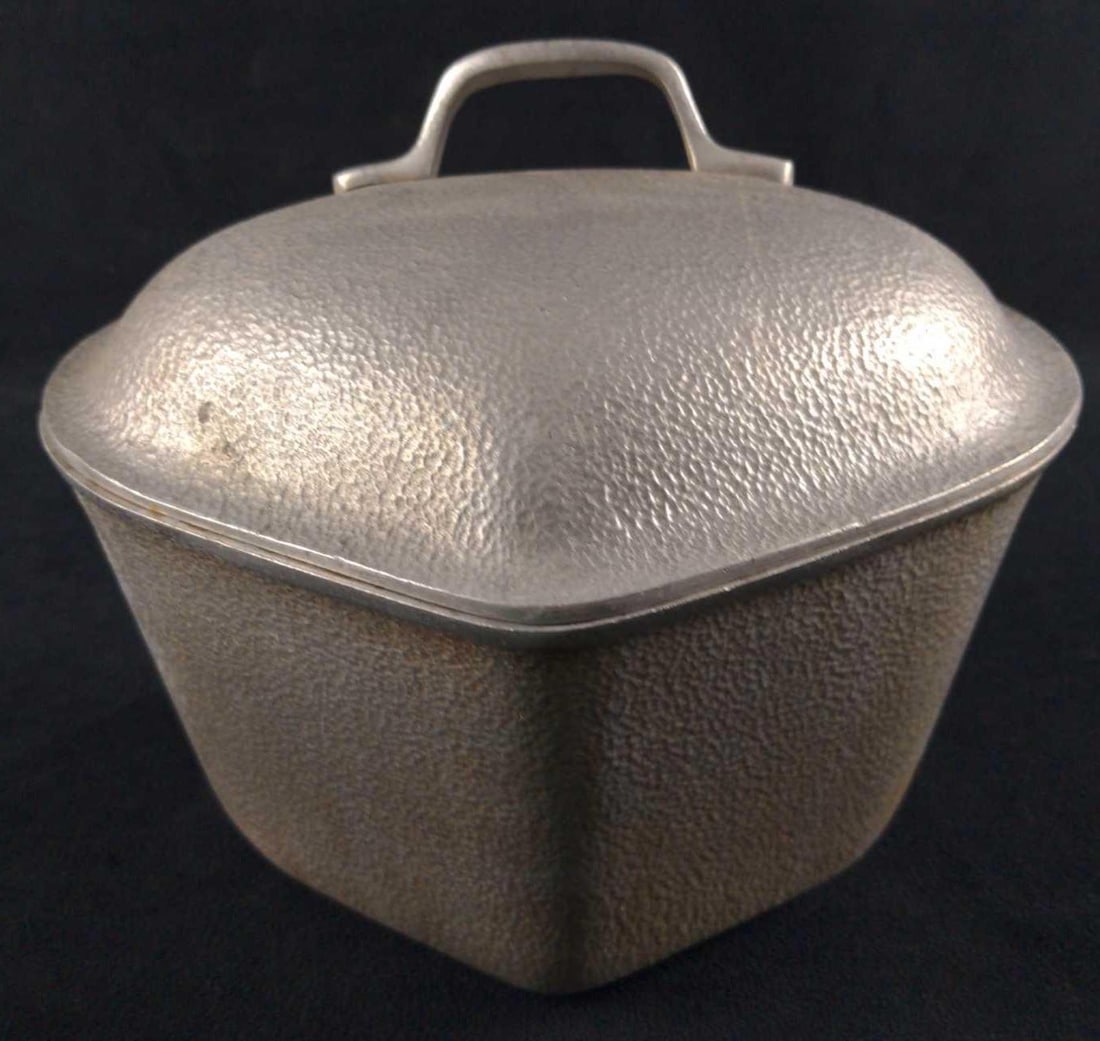Vintage Silver Seal Aluminum Dutch Oven Pot B: 1930s Silver Seal hammered aluminum pot with a lid. Is approx 9" x 7 1/2" x 7". Is in good, vintage condition with some wear. Needs a good cleaning before use or display.