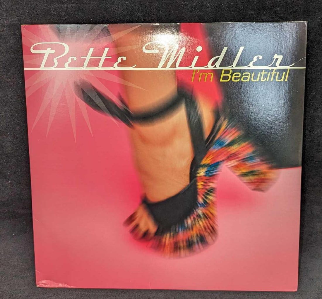 Bette Midler I'm Beautiful Maxi Single LP: Bette Midler I'm Beautiful Maxi Single LP. This was released by Warner Bros in 1999. This is approx 12 1/4" x 12 1/4" and it weighs 0.75lb. Double LP. The records have light markings and scratches
