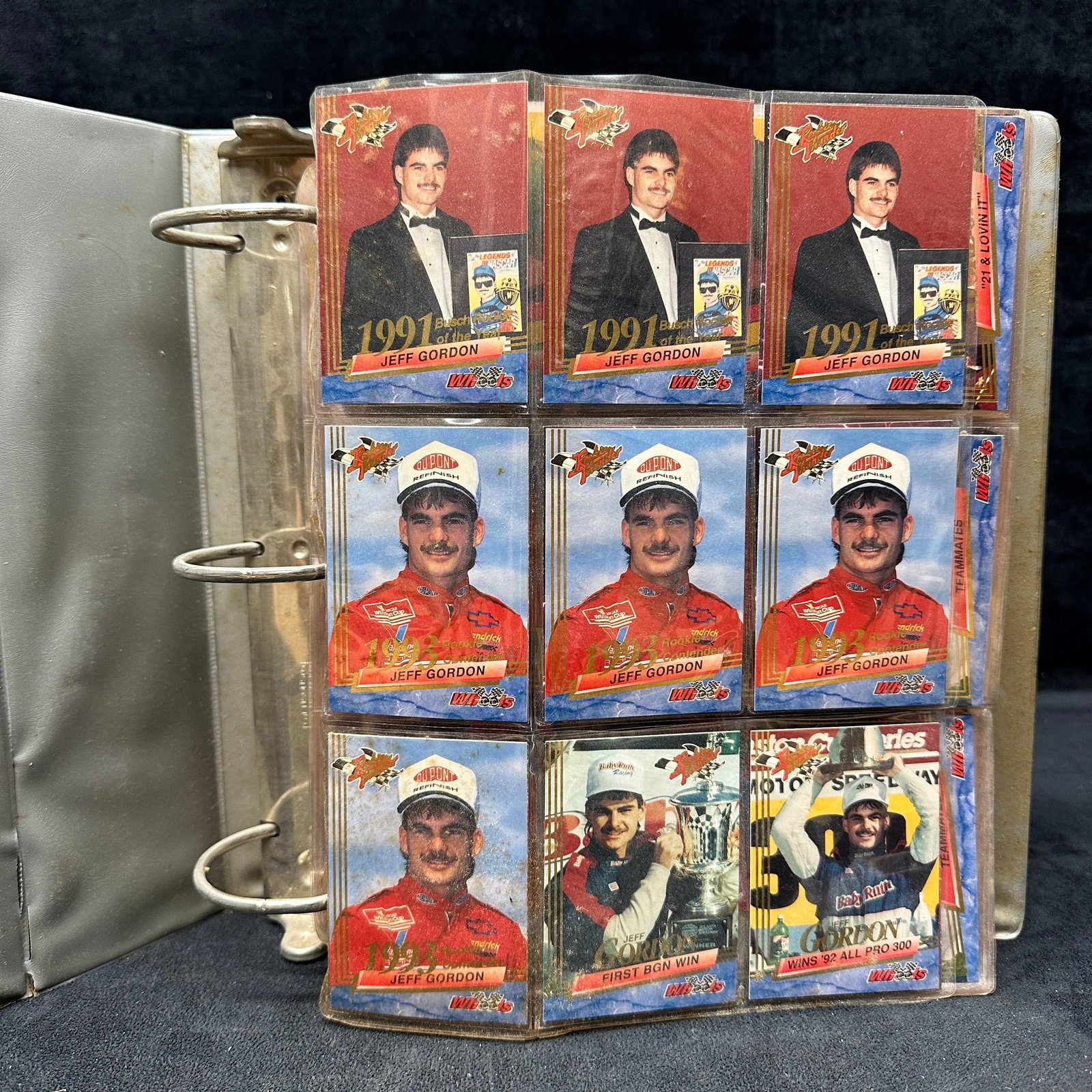 145 Race Card Collection NASCAR Finish Line 1990s Era: A lot of 145 cards total, all NASCAR 1990's racing sport cards with duplicates. Some card sleeve slots have multiple cards. Multiple additional plastic protective sleeves are included in the binde